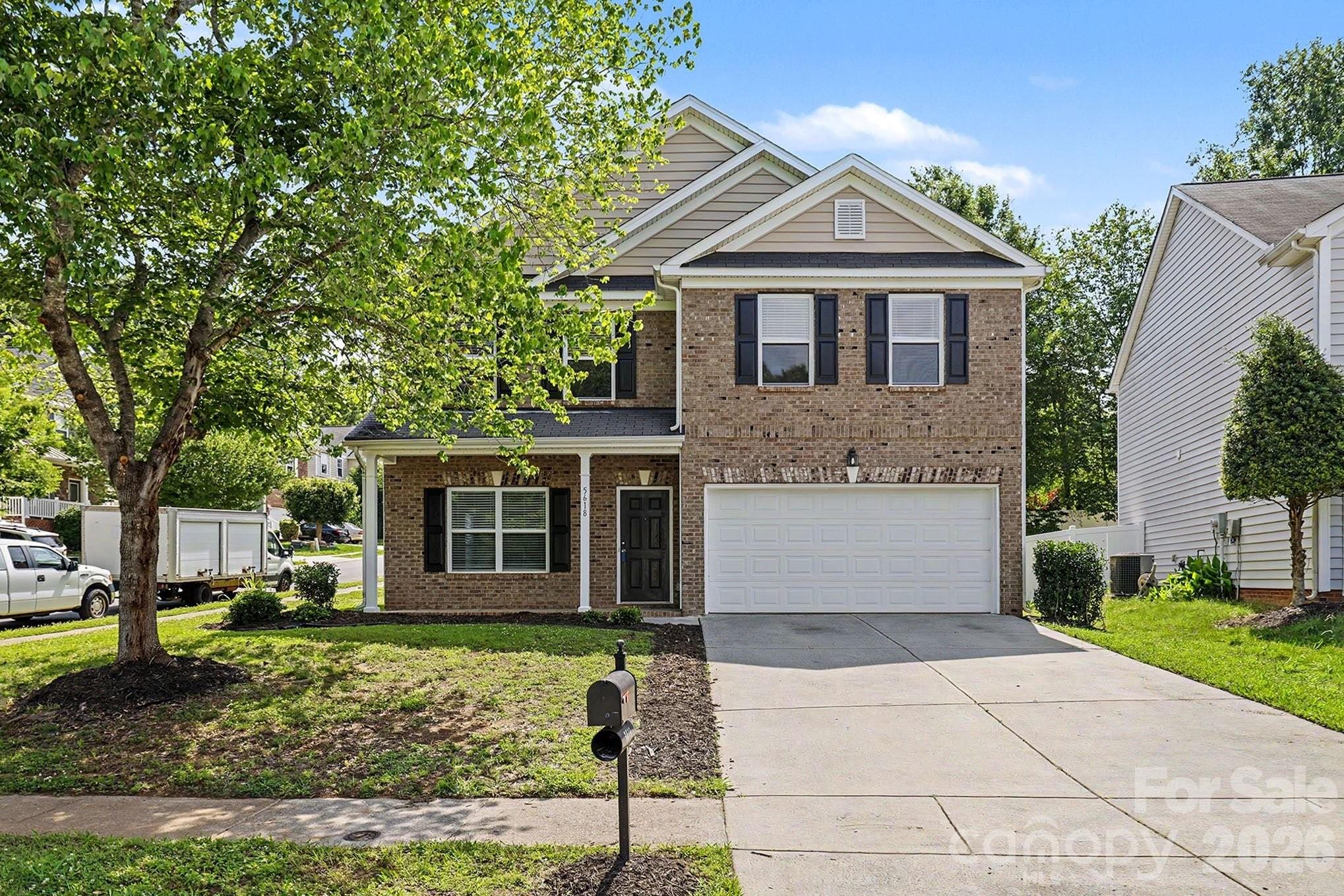 This 4-bedroom, 2.5-bathroom two-story home is situated on a desirable corner lot, offering extra curb appeal and outdoor space. The interior is designed for a large household, featuring multiple living zones, including an extra living room on the main level and a versatile loft on the second floor. The heart of the home is the expansive family room, which is seamlessly attached to the kitchen and breakfast area, making it perfect for gatherings.

The kitchen is equipped with a modern mix of black and stainless steel appliances and durable laminate countertops. Functional details abound, with walk-in closets in the bedrooms, included window treatments, and a cozy fireplace in the main living space. For added convenience, the first-floor laundry room is integrated with additional pantry space, maximizing the home's storage and utility.