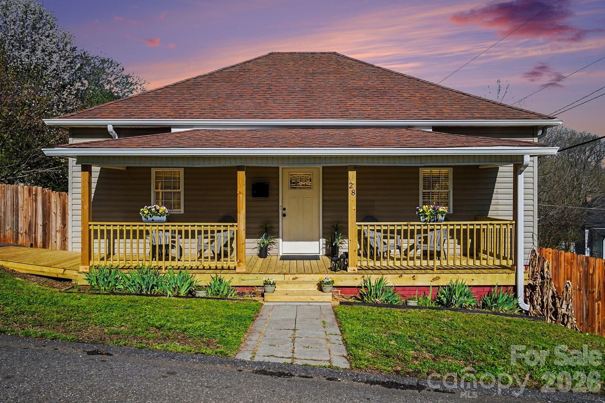 *SELLER TO OFFER $5,000 CREDIT WITH ACCEPTABLE OFFER + HOME WARRANTY INCLUDED!*

Welcome to charming small-town living in the heart of Old Town Cramerton! Ideally located within walking distance to local shops, dining, and community amenities, this home also offers easy access to the outdoor lifestyle Cramerton is known for — including trails, kayaking, biking, and recreation at Goat Island Park and Riverside Park. Residents also enjoy free admission to the community pool.

Situated on an up-and-coming street, this charming bungalow blends character, functionality, and thoughtful updates. The expansive new front porch with accessible ramp provides rare zero-entry access and inviting curb appeal.

Inside, fresh neutral paint and abundant natural light highlight the beautiful engineered hardwood floors throughout. The welcoming foyer opens into a spacious family room featuring an elegant tray ceiling that adds warmth and charm.

The large eat-in kitchen offers ample cabinetry, granite countertops, stainless steel appliances, and a pantry — perfect for everyday living and entertaining alike.

Generous bedrooms provide exceptional storage rarely found in homes of this style, including spacious closets, a coat closet, linen closet, pantry, and dedicated laundry room.

Step outside to enjoy private outdoor living with a fenced backyard and new deck — ideal for relaxing evenings, pets, or entertaining guests.

Recent improvements include fresh interior paint, new gutters and fascia, new front porch, new back deck, and a new crawlspace vapor barrier. The home is also termite bonded for added peace of mind.

Move-in ready and full of charm — what more could you want?