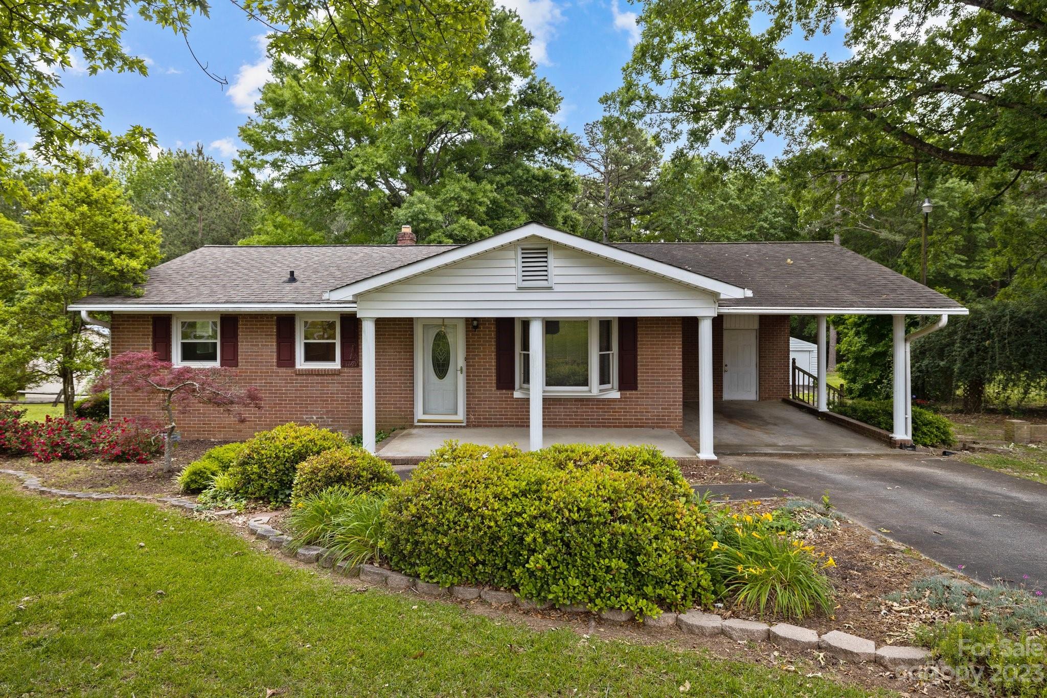 BUFORD COMMUNITY and SCHOOLS! This 2 bed 1 bath home is located on .55 acre lot with majestic oaks and mature landscaping. The kitchen and has ample storage and counter space and an eat-in area with access to the sizeable deck that overlooks the backyard that has wooded views and large storage building/workshop. The southern charm and character of this home makes it a perfect starter or investment. The sellers have chosen to sell the property AS_IS and are not interested in doing repairs.