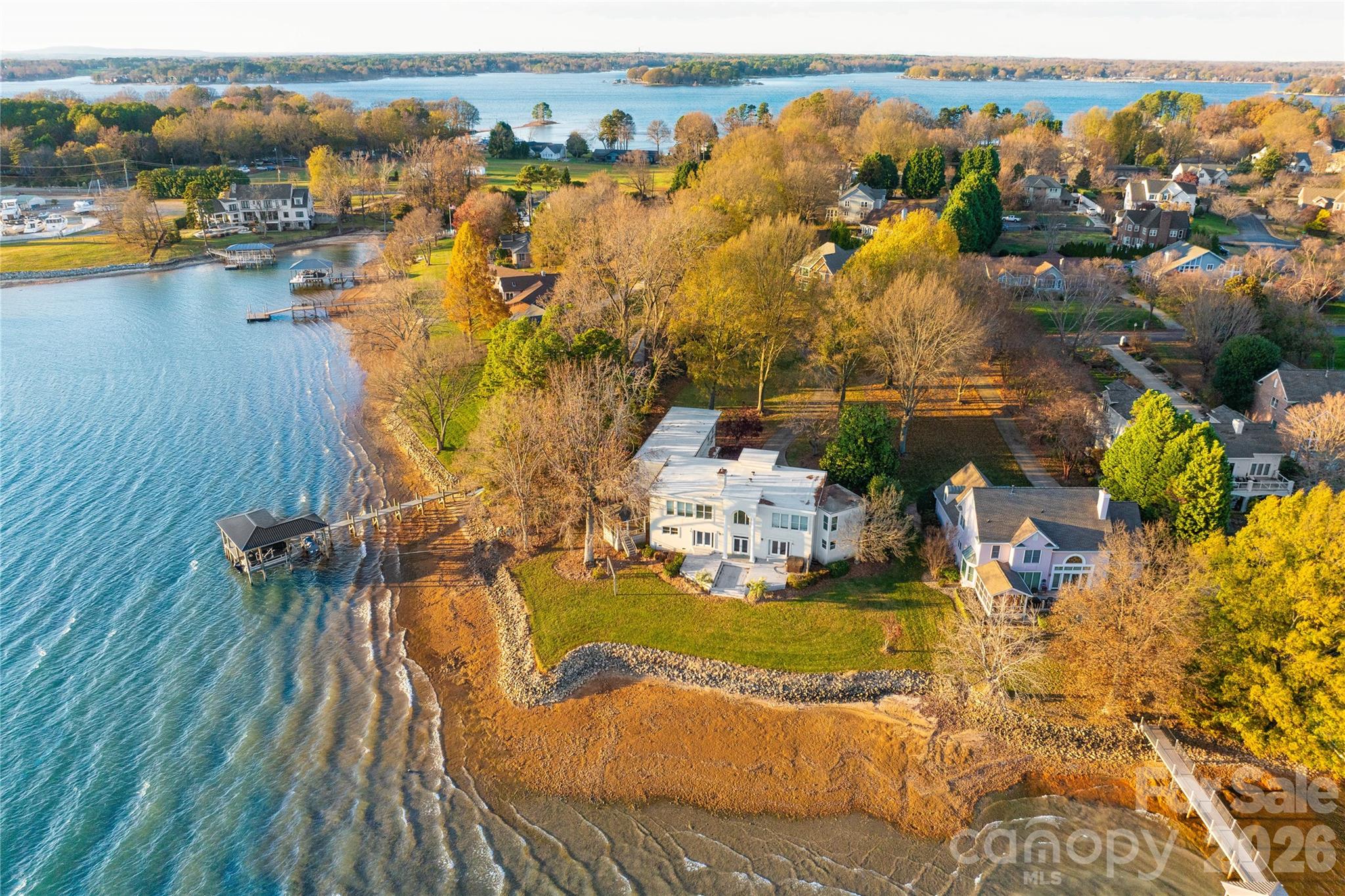 Extraordinary opportunity to secure 1.039 acres on Lake Norman with over 200 feet of shoreline and breathtaking long-range water views. Properties offering this combination of expansive frontage, sweeping vistas, and generous lot size are increasingly rare.

The existing home is being sold as-is and will likely be best suited for a comprehensive renovation or new construction, presenting an exceptional opportunity to bring your architect and builder to create a signature Lake Norman estate. 

The true value lies in the land—its scale, its shoreline, and the extraordinary views. A remarkable setting for those seeking to design and build a legacy waterfront residence on Lake Norman.