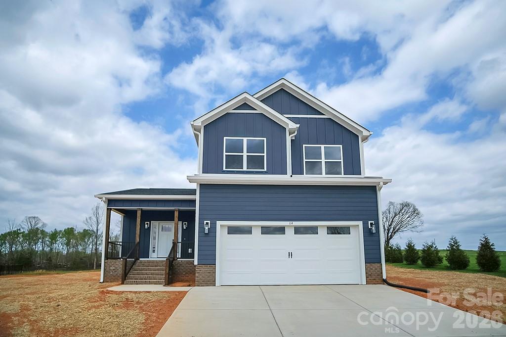 Discover this beautiful new construction home in the desirable Vintage Woods community, nestled on a spacious half-acre lot. Inside, waterproof Pergo flooring flows throughout an open-concept layout designed for modern living. The oversized eat-in kitchen is a standout, featuring abundant cabinetry, a large island, quartz countertops, and stainless steel appliances. The main level also includes a pantry and convenient half bath. Upstairs, the spacious primary suite offers a tray ceiling, walk-in closet, and a stunning bath with dual vanity, tile shower with seamless glass, and linen closet. Two additional bedrooms, a full bath with tub/shower combo, and a laundry room complete the upper level. * 2-10 Home Warranty Included with Purchase *