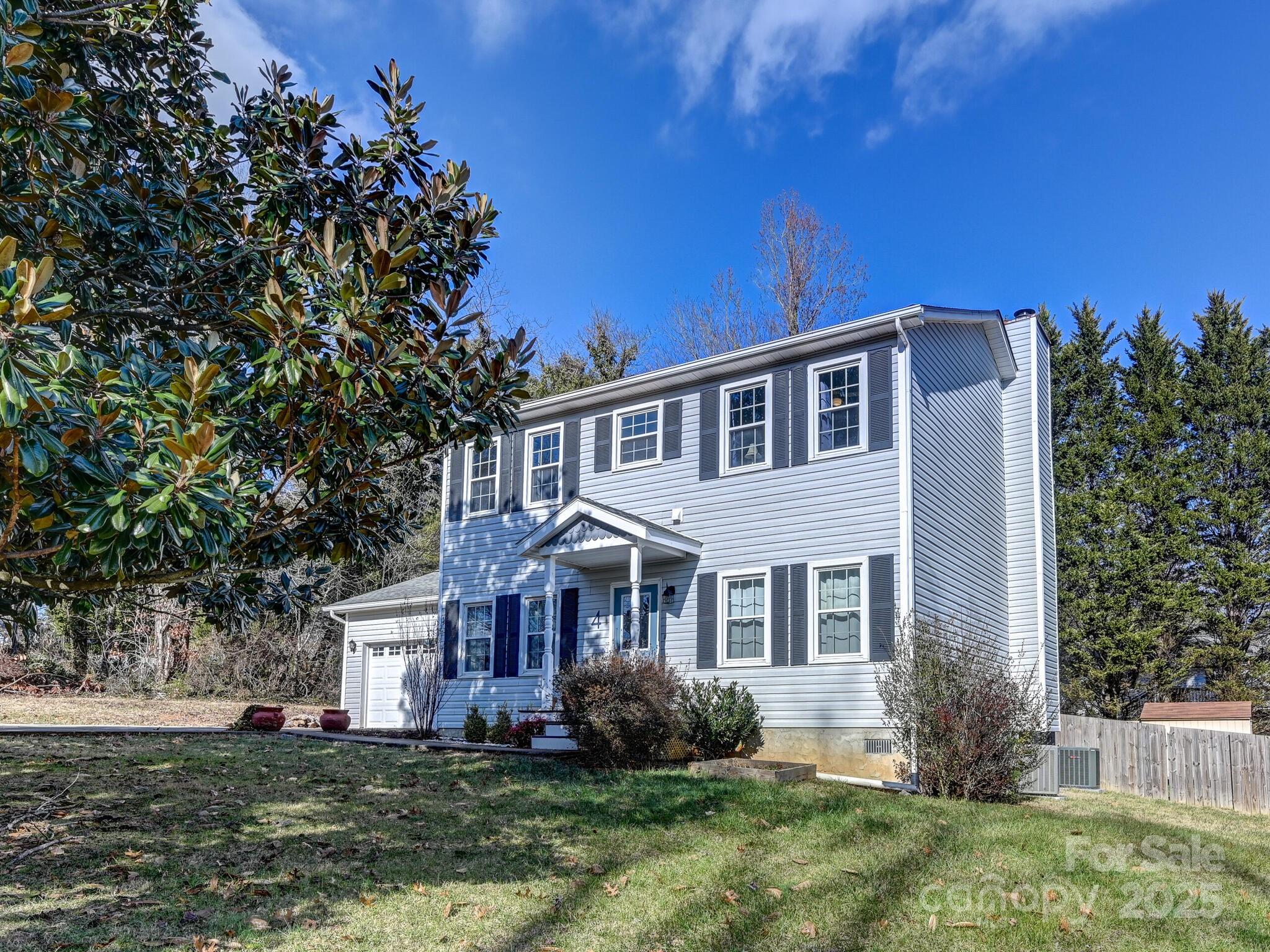 Discover this wonderful 3-bedroom home in the desirable Oakley neighborhood of Sweetbriar Grove, offering a perfect blend of comfort and convenience. This picturesque house is just a short drive from downtown Asheville and South Asheville, providing easy access to all the area has to offer. Set on a level corner lot on a quiet cul-de-sac street just outside city limits, this home offers tranquility and accessibility. The main floor features a spacious layout with a 1/2 bath, bonus room, office, large kitchen, dining area, and a cozy family room. Upstairs, you'll find 3 bedrooms, including the owner's suite, 2 full baths, and a convenient laundry room. The property also has an attached 2-car garage, a fenced backyard perfect for pets and gatherings, and a large rear deck with a retractable awning to enjoy summer evenings outdoors. Plus, the renowned Mountains-to-Sea Trail is close by, allowing you to explore nature from your home!  Don't miss this incredible home!