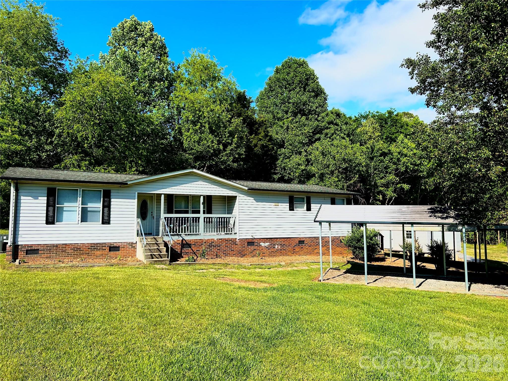 This charming single-level home in Valdese, NC offers both comfort and convenience, just a short drive from downtown Valdese. Situated on approximately half an acre, the property features a spacious front yard perfect for outdoor enjoyment. Inside, you’ll find a generously sized kitchen and living room area. The HVAC system was fully replaced in 2024/2025. Additional highlights include two covered parking areas and two storage buildings, offering ample space for vehicles, and hobbies. Large privacy trees.

Fridge does have an ice maker, waterline has not been hooked up/run. Road is not publicly maintained.