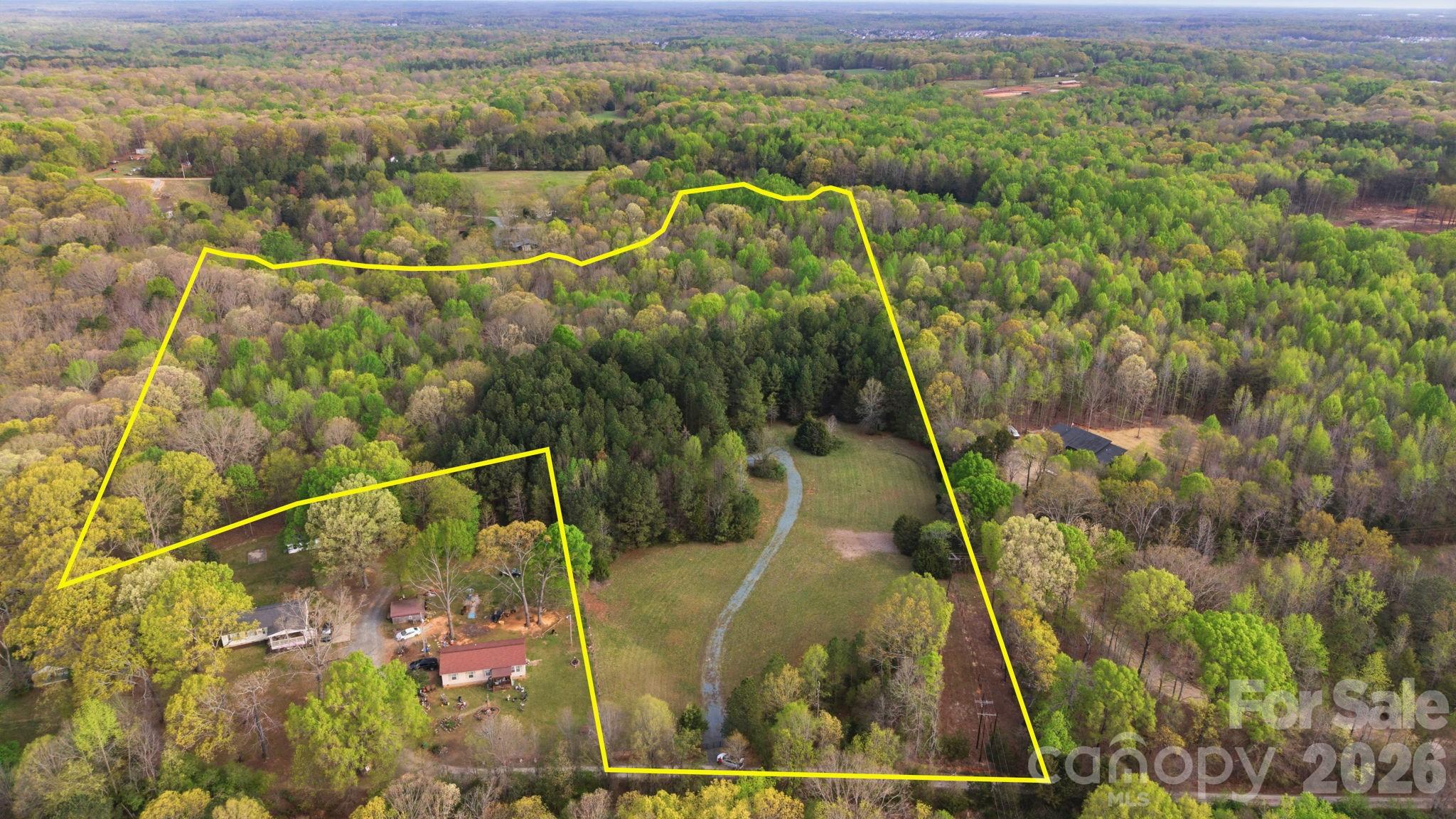 Escape to the tranquility of Mineral Springs with this 9.6 +/- acre parcel, offering the perfect combination of privacy, natural beauty, and opportunity. Partially wooded, this property provides a serene, secluded setting while still allowing ample space to design and build your dream home, private retreat, or weekend getaway. There is an existing septic permit for the property for 4 bedrooms. Enjoy the peaceful surroundings and the sense of privacy this property offers, all while being conveniently located in the charming Mineral Springs area.
