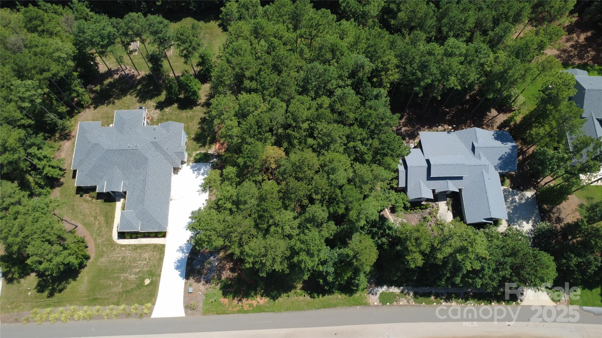 Come build your dream home on a .77-acre prime homesite! Known for its acre-plus lots, luxury residences, and unmatched amenities, Riverchase has become the community of choice for those seeking peace and nature without leaving the conveniences of the city behind. Riverchase Estates allows for you to bring your own custom builder to make your dreams a reality. You get the resort-like, one-of-a-kind community features a freeform pool, $4.6 million clubhouse, playground, tennis courts, fitness center, and amphitheater of the community to go with the home you design. This wooded lot allows for you to pick which trees you want to keep so you are not having to plant seedlings and wait for them to mature. This lot also has Low taxes, easy access to I-77. Tons of new homes are being built currently so get this well-placed lot before it is gone. Shown in the photos is a proposed residence by Classica Homes. The featured design, the Santa Fe Ranch with Basement, is one of Classica’s most celebrated and desirable floor plans. Beloved for its seamless main-level living and the versatility of a finished basement, it combines easy everyday living with abundant space for entertaining, hosting guests, or enjoying multi-generational life. If you dream of something different, Classica Homes will work with you to design a custom masterpiece that reflects your vision.