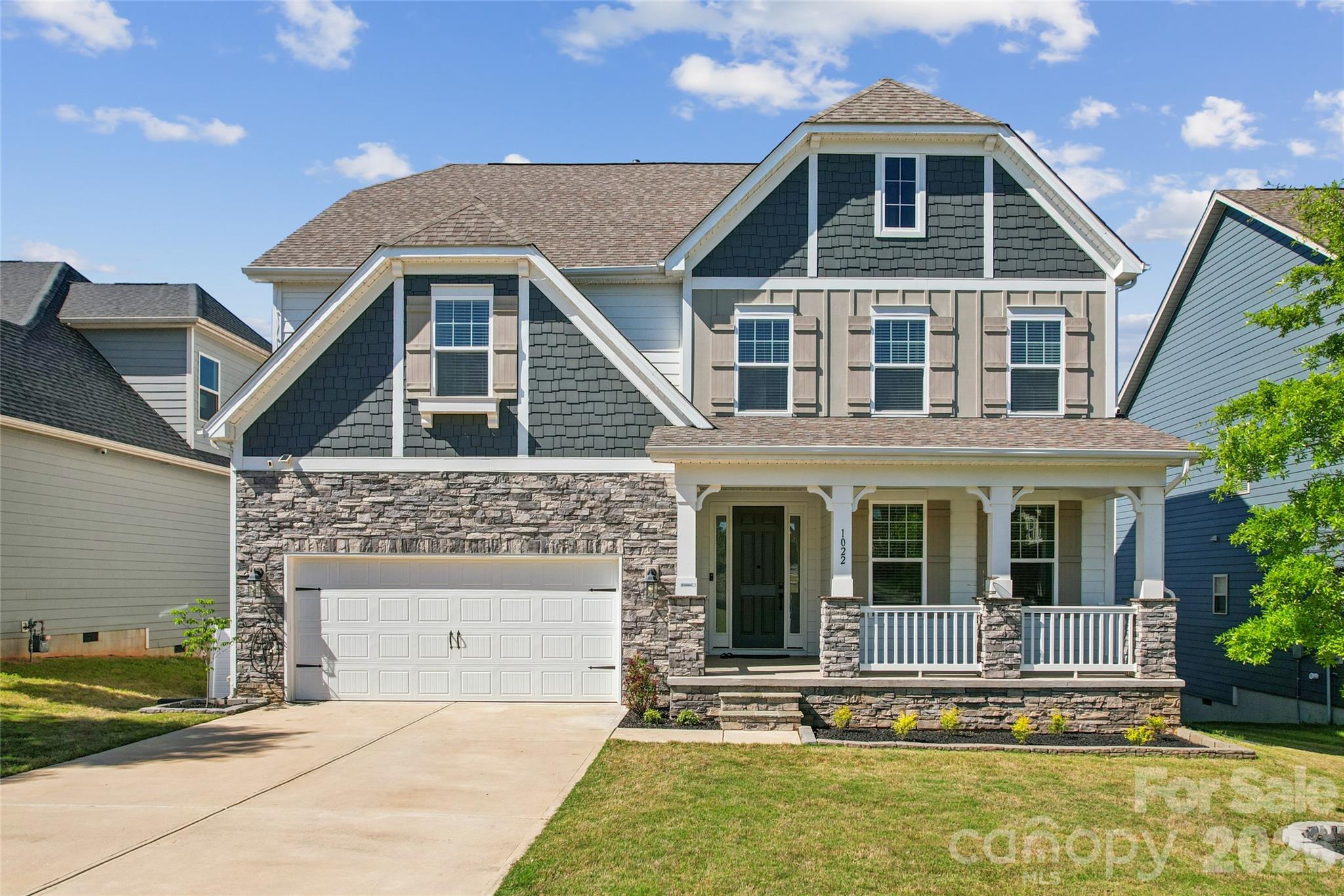 Welcome to this stunning "Eastover" floor plan in highly sought-after Overlook at Barber Rock subdivision, where modern elegance meets functional design. This 5-bedroom, 3-bath residence greets you with a charming covered front porch and a formal dining room featuring a sophisticated tray ceiling. At the heart of the home, a gourmet kitchen boasts a massive center island, butler’s pantry, and top-tier gas appliances—flowing seamlessly into a sun-drenched breakfast area and a spacious family room anchored by a cozy gas fireplace.

The main level offers a private guest suite, while the upper level serves as a true retreat with a versatile bonus room (acts as 5th bedroom) and a luxurious Owner’s Suite complete with tray ceilings and a spa-like bath. Step outside to the screened rear deck to enjoy peaceful South Carolina evenings just across Ballantyne. With premium upgrades throughout, including oak stair treads and a convenient drop zone off the 2-car garage, this home is the perfect blend of style and comfort. 

Enjoy the outdoors from your screened-in back deck or the community cabana and pool. Zoned for top-rated schools and located just minutes from shopping and dining. Your dream home awaits!