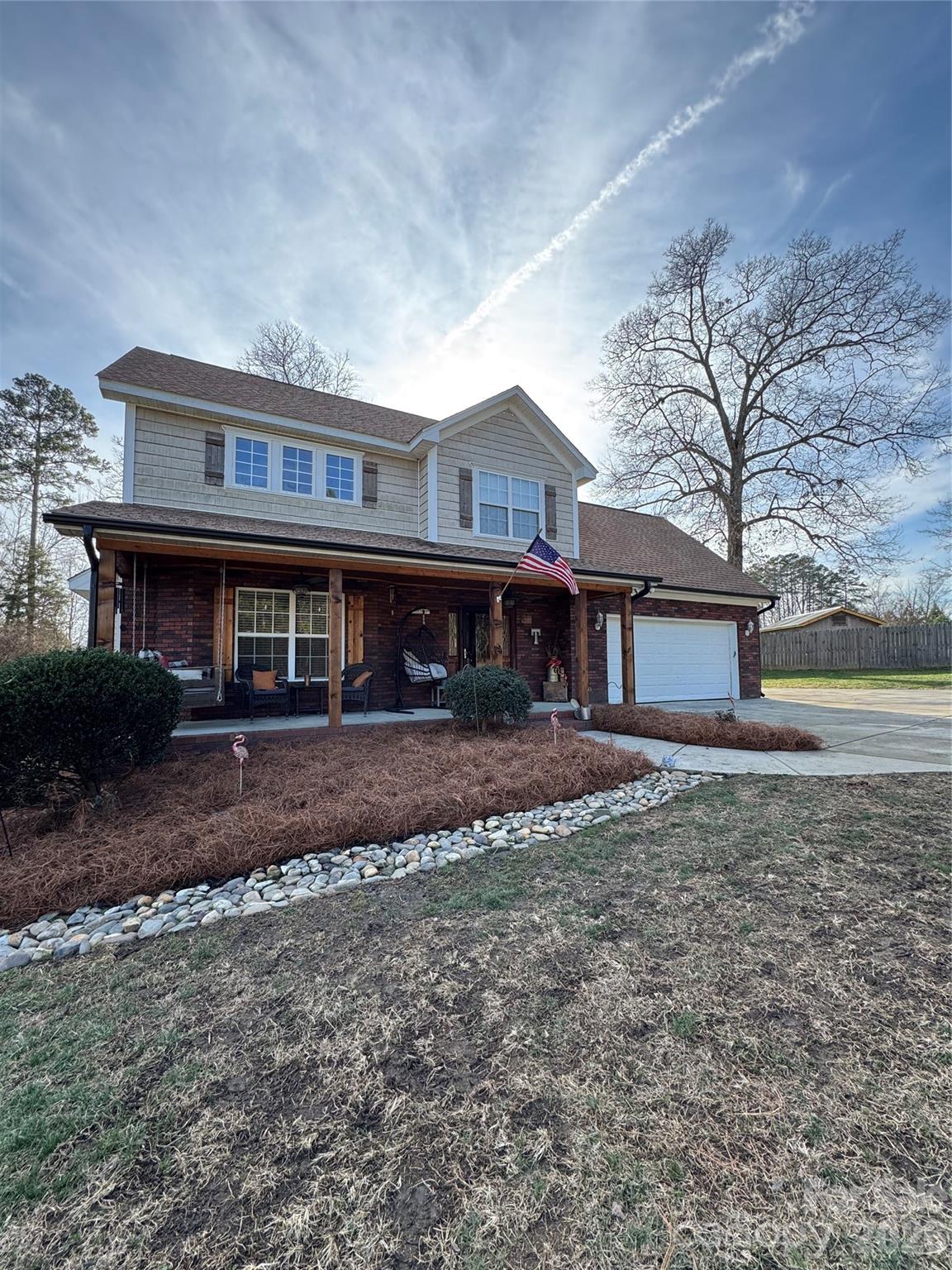 **MOTIVATED SELLER**Seller is willing to pay a portion of the buyer's closing costs and/or an interest rate buydown**  Ideally located for an easy commute to Concord, Charlotte, or Albemarle, this home also enjoys the charm of the revitalized small town of Mt. Pleasant, with restaurants, retail, and entertainment just seconds away. Relax on the inviting front porch swing, perfect for morning coffee or unwinding in the evening while enjoying the quiet neighborhood. Inside, the open floor plan with high ceilings and real wood floors creates a warm and welcoming space ideal for entertaining. The oversized primary bedroom on the main floor features a generously sized closet, while the large upstairs bedroom offers flexibility as a guest room, office, or additional living space. Step outside to the back patio, conveniently located off the kitchen and dining area, and well-suited for grilling or evening gatherings. Recent improvements include fresh downstairs paint, upgraded front porch with wood posts and ceiling replacing vinyl, new kitchen plumbing and light fixtures, and a stylish backsplash. New roof in 2021 and new HVAC in 2025.