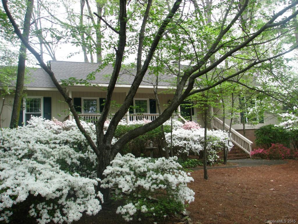 Charming, private ranch home in desired River Hills. Hidden Gem! Large living and dining rooms with hardwood floors. Renovated kitchen with separate breakfast area. New skylights, cabinets and appliances. Lovely family room with bar for entertaining. Bright sunroom overlooks private wooded yard, great for all seasons. (Sunroom is not included in sq footage) Lots of storage in floored attic, workshop in garage and basement area.  All new windows. New HVAC. New paint. Clover schools, low SC taxes.