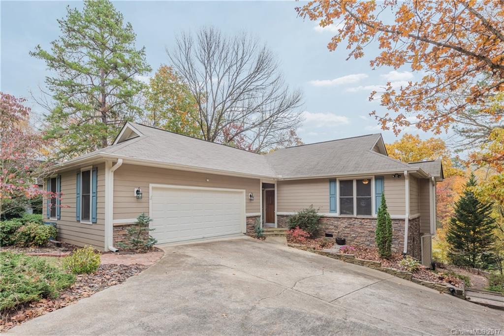 Enjoy the convenience of living on the Golf Course while taking advantage of a Great Location just minutes from Charlotte NC. This Beautiful 3 BR, 3 BA Newer Home is perched on a Wooded Lot & offers a Walk–Out Basement w/Multi- Purpose RM, Large BR & Full BA. The entrance level boasts Open Floor Plan w/tons of Natural Lighting & Covered Porch. The Spacious Kitchen has Granite & SS Appl., The Lg. Family RM displays Built-ins & Gas FP, & Finished Garage offers storage. Enjoy the tons of Amenities.