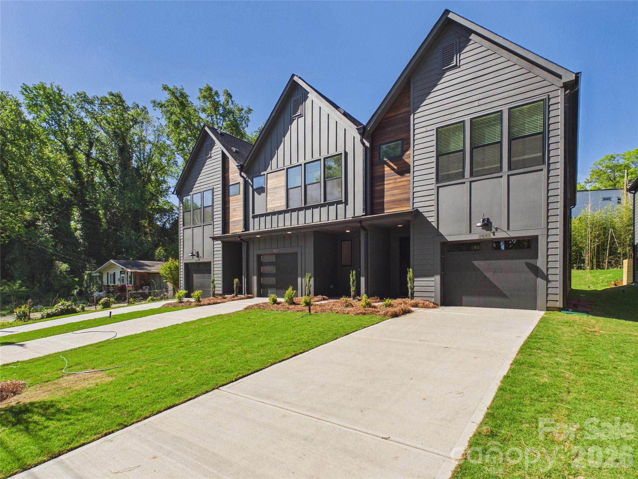 New construction with direct access to the greenway and nearby pickleball courts. This move-in ready Smallwood townhome offers a lifestyle that’s hard to find this close to Uptown Charlotte. With 2,027 square feet, 3 bedrooms, and 2.5 baths, the home features an open-concept layout with modern finishes and thoughtful design throughout. The spacious loft provides flexibility to fit your lifestyle — perfect for a home office, media room, or wellness space. Soft close cabinets including built-in pantry and linen cabinets, 9'ceilings on both levels and quartz countertops offer a touch of luxury. Enjoy low maintenance living with a private patio plus yard space, a one-car garage, and the convenience of everything this quickly growing area has to offer - dining, coffeeshops, breweries and more. Builder warranties included and up to $15,000 incentive that can be used towards closing costs or a rate buy-down with a preferred lender. If you’re looking for modern living and outdoor connectivity just minutes from the city and Wesley Heights, this Smallwood townhome checks every box. Schedule your tour today! Check out our virtual tour of this staged floor plan.