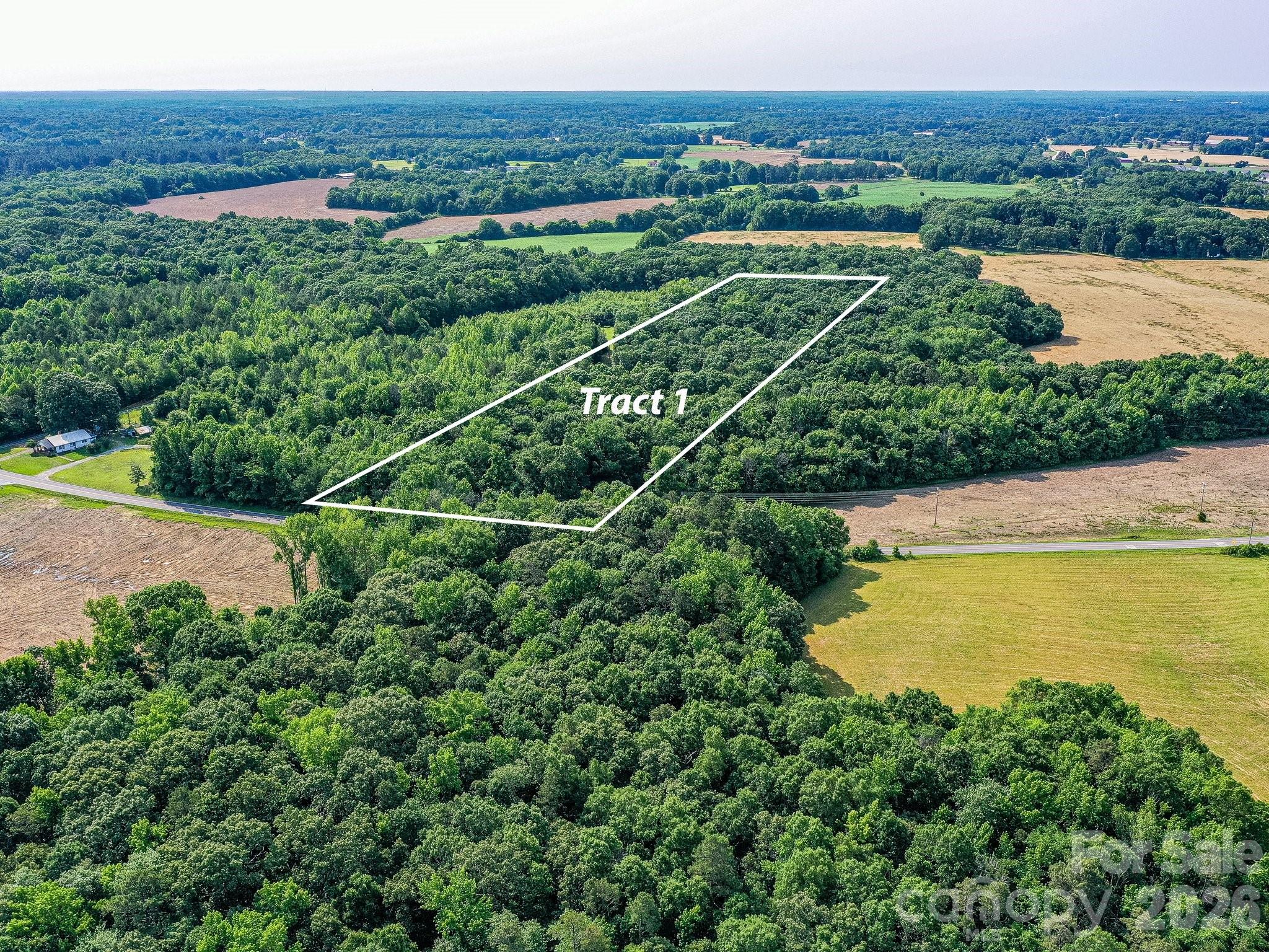 Make reasonable offer! If Privacy, Location and Woods are your dreams for a new home - this is it!  Beautiful Hardwoods ready for your beautiful oasis.  Prime location! Minutes to Hwy 74 Bypass and I 485.  Minutes to Indian Trail and Matthews but just inside Monroe in Unionville township.  Road frontage is marked with pink flags on each corner.  There are additional lots across the road and are listed in MLS as well.  Soil work has been done and attached in MLS. Per seller there are 2 great areas for the home site.  
Call for more details. Additional lot for sale across road. Lot 2 is 4.57 acres/$259,000. Lot 3 is SOLD