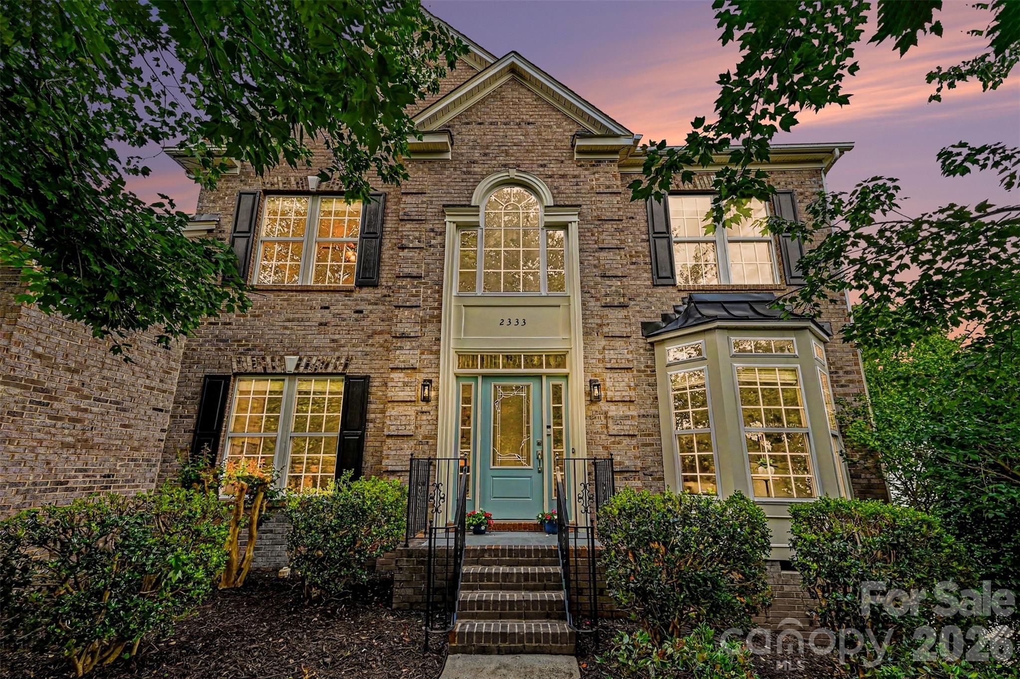 Welcome to this beautifully updated 5-bedroom, 3.5-bath home offering 3,187 square feet of comfortable living space in a desirable Fort Mill community.  Freshly painted, this move-in ready home combines timeless charm with modern upgrades. The spacious floor plan features hardwood floors throughout the main level, elegant formal living and dining rooms with bay windows, a private home office, and a large great room with custom built-ins perfect for gathering and entertaining. The upgraded kitchen showcases beautiful granite countertops, updated backsplashes, newer stainless steel appliances, and a center work island, creating an ideal space for cooking and hosting.
Upstairs, you'll find four generously sized bedrooms plus a versatile bonus room that can serve as a fifth bedroom, media room, playroom, or additional living space. Relax year-round in the vaulted sunroom overlooking the private backyard. Outdoor living is exceptional with a spacious deck, providing plenty of room for grilling, entertaining, and enjoying Carolina evenings.  With thoughtful updates, abundant living space, and a prime Fort Mill location close to shopping, dining, and top-rated schools, this exceptional home is one you won't want to miss.