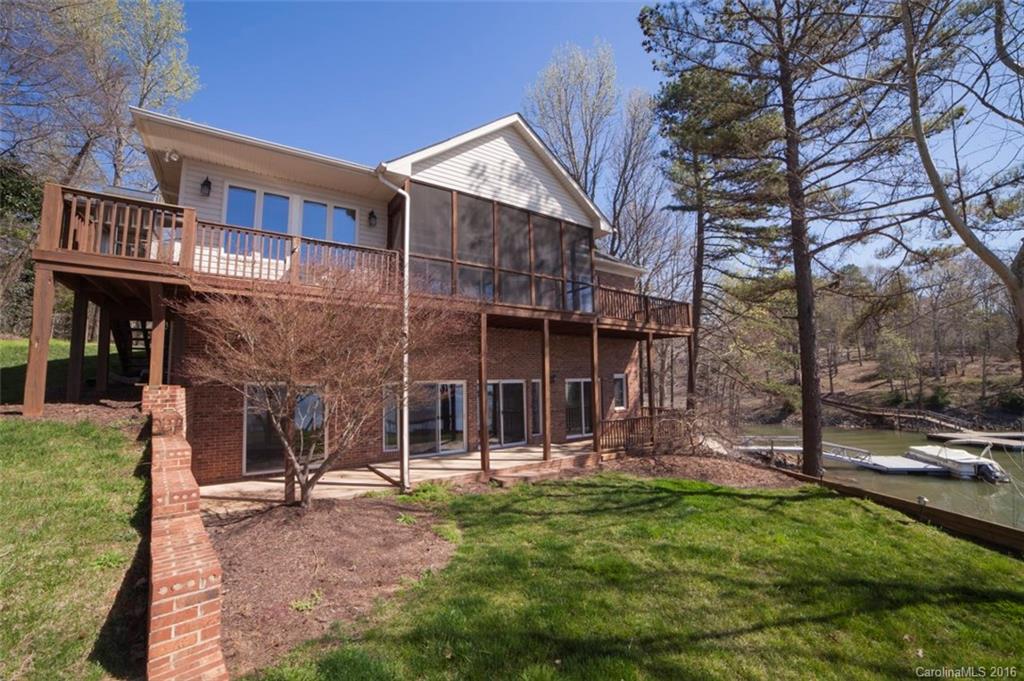 This home has it all! Beautiful waterfront home with breathtaking views on desirable lot. Dual master bedrooms and baths on main level. Well equipped kitchen features gas stove, granite counters and breakfast room. Lower level has second living space and views for everyone. Elevator in home for convenience between floors. Paved drive and 2-car garage. Great boat lift and dock in place with gentle slopping yard. Bring your family and boat and move right in!