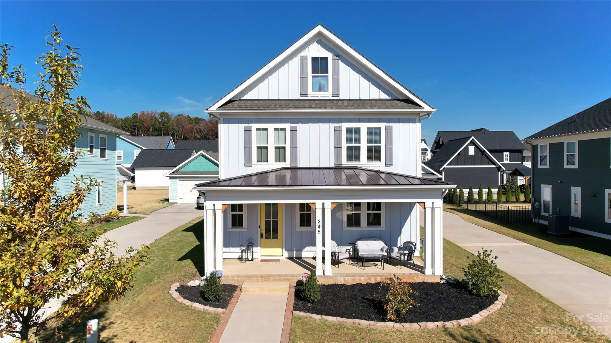 Welcome to your dream home in the coveted Riverwalk neighborhood! This stunning and gently lived-in Charleston-style two-story home was built in 2021, boasts 3 bedrooms with 2.5 bathrooms, and a detached 2-car garage with a long private driveway. Enjoy the elegance of a modern open-concept living space and a chef's kitchen with stainless appliances, a 5-burner gas range with a sleek stainless hood, upgraded quartz countertops, and a stunning tile backsplash. The split-bedroom design features large walk-in closets, a tankless water heater, and is overflowing with natural light. Enjoy mornings with a coffee on your front porch or a cool evening in your fully fenced yard, complete with a covered patio and custom-designed fire pit. As if this wasn't enough, the Riverwalk district is expanding rapidly as one of the hottest communities in Rock Hill and offers tons of amenities plus easy access to great local restaurants, shopping, and I-77 for seamless commuting or travel. Come visit today!