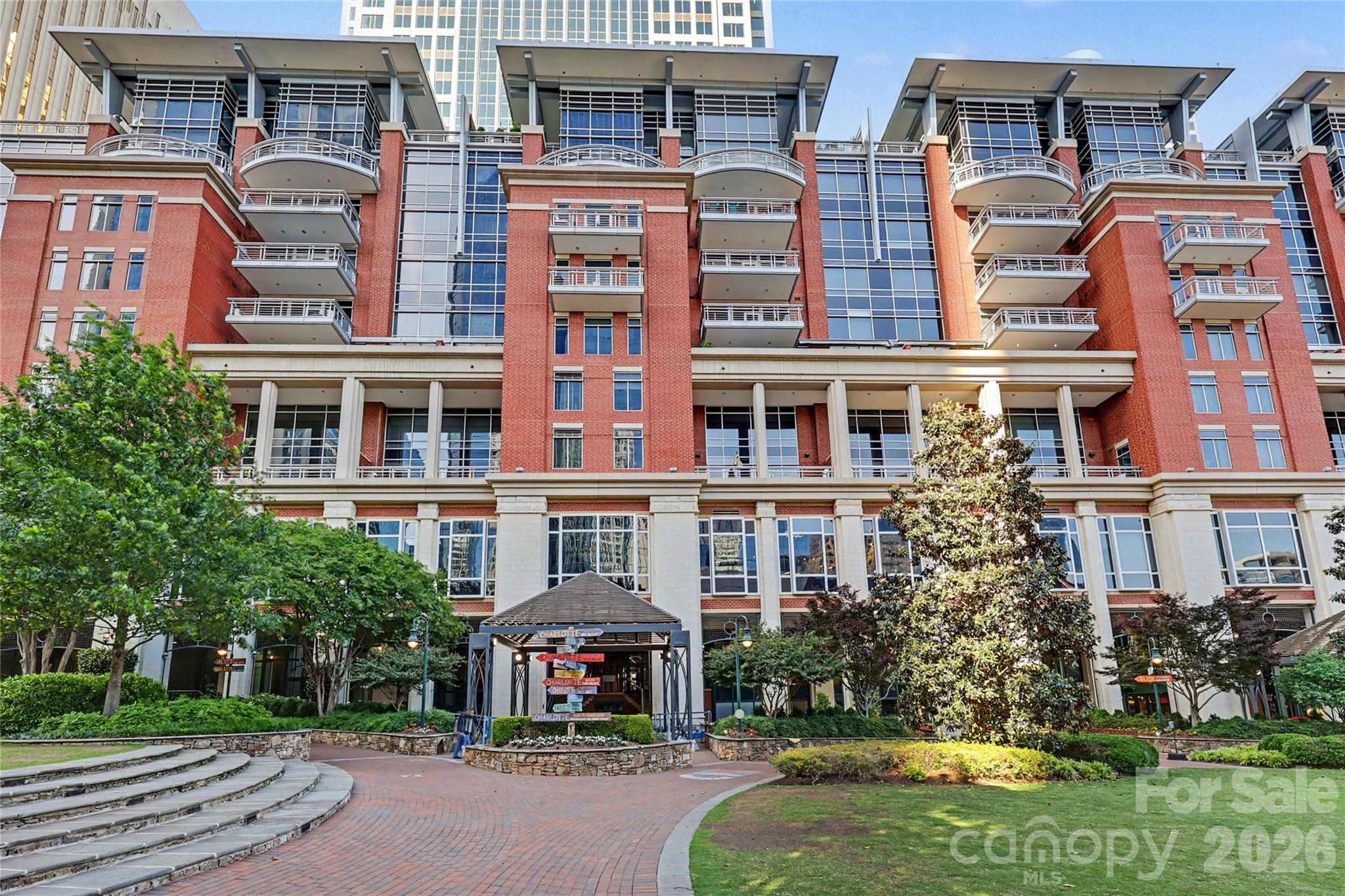 Located on the South End of Uptown, this exceptional residence at The Ratcliffe offers an ideal blend of luxury, convenience, and city living. Open living spaces are filled with natural light and showcase grand views of The Green and Charlotte skyline. A striking fireplace with custom built-ins anchors the living area and flows into the dining area and well appointed chef’s kitchen. One of the home’s standout features is a 410sf private, south-facing terrace complete with a gas grill hookup — an incredible extension of the living space for relaxing outdoors. The spacious primary suite features a spa bath, dressing area with built-ins and two large walk-in and custom closets. Two deeded parking spaces are located in a secured, gated section of The Green parking garage, with ample guest parking available evenings and weekends. Residents enjoy a vibrant community with social events and a wonderful on-site property manager. With direct access to Uptown’s sports and entertainment venues, The Mint Museum and The Bechtler,  plus close proximity to South End and the future pedestrian bridge connection, this is Uptown living at its finest.