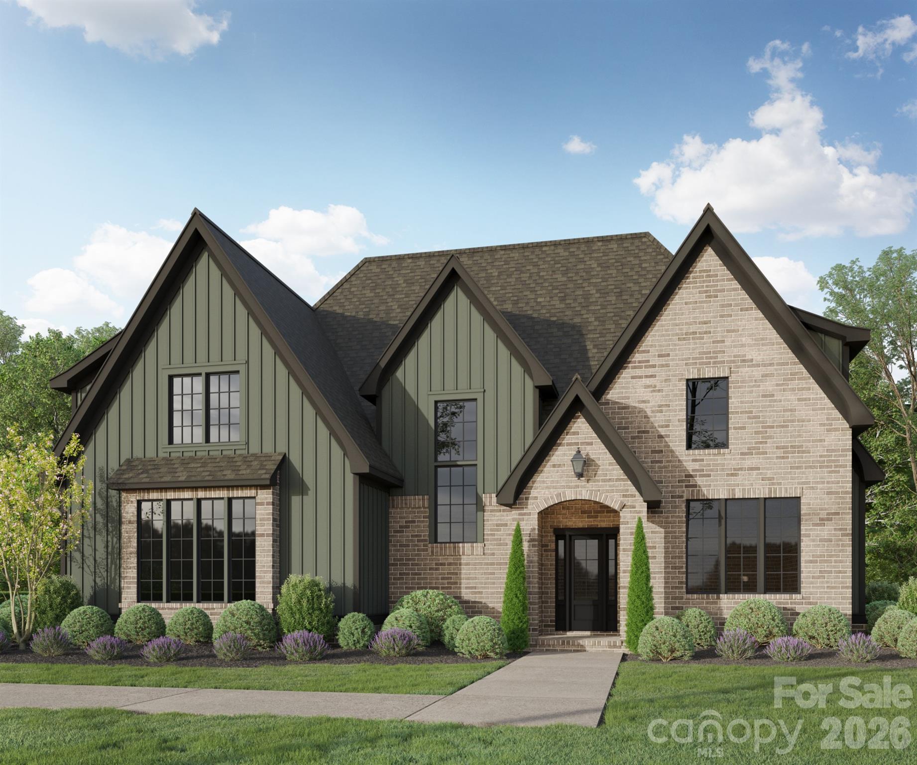 Welcome to Kinger Homes’ premier luxury enclave, Williamson Woods, an exclusive collection of 38 distinctive residences set on 100-foot-plus-wide homesites of approximately half an acre. Designed for those who value privacy, craftsmanship, and elevated design, this community offers a level of quality and refinement that is truly a step above.
Each home is thoughtfully curated with custom detailing, blending timeless European-inspired exteriors—painted brick, rich wood accents, dramatic rooflines, and oversized statement windows—with sophisticated, modern interiors. Striking curb appeal and expansive spacing between homes create a streetscape that feels grand, and private.
Inside, expansive open-concept floor plans are designed for both everyday luxury and exceptional entertaining. Designer kitchens anchor the main living spaces, showcasing statement 48” professional ranges, 48” paneled refrigerators and dishwashers for a seamless furniture-style aesthetic, custom ceiling-height cabinetry, and oversized quartz islands. Carefully selected designer lighting, curated tile installations, and elevated trim details reflect a high level of craftsmanship throughout.
Engineered hardwood flooring extends across the main living areas, complemented by custom millwork, architectural archways, and thoughtfully designed sightlines that enhance both flow and natural light. Indoor and outdoor fireplaces create inviting gathering spaces year-round, while covered outdoor living areas elevate entertaining to a resort-inspired experience.
Spa-like primary suites feature luxurious baths with freestanding soaking tubs, oversized walk-in showers, designer fixtures, and boutique-style closets. Flexible bonus rooms offer space for a private media lounge, executive home office, fitness studio, or playroom—tailored to your lifestyle.
Setting this home further apart is the standard smart home integration package. Details like Cat6 wiring, Power over Ethernet, Tech Closet, dimmable lighting and switches, smart lock entry doors, ring door bells, EV ready garages, and integrate in-ceiling speakers in the living room and outdoor deck. 
Located just minutes from the charm and convenience of downtown Mint Hill and with easy access to Matthews and Charlotte, this intimate community delivers a rare opportunity: estate-sized homesites, custom-level finishes, and architectural distinction in a setting that feels both private and connected.
Experience refined living redefined—where craftsmanship, design, and scale come together to create something truly exceptional. Builder reserves right to modify plans, specifications, materials, and features without notice. Renderings and specifications are for illustrative purposes only.