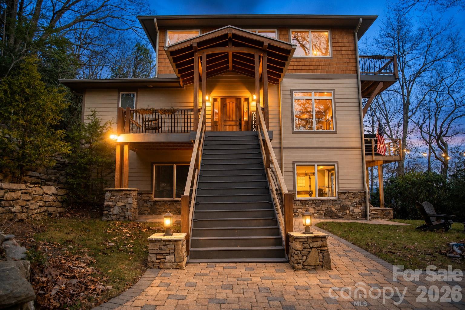 Discover a rare opportunity to own a thoughtfully designed mountain retreat that combines breathtaking year-round long-range views, exceptional energy efficiency, and a proven history as a successful part-time vacation rental.

Perched on 2.17 private acres just 20-25 minutes from Asheville, Asheville Regional Airport, Hendersonville and Black Mountain, this architecturally designed home was created with extraordinary attention to detail. Expansive southwestern panoramic views take center stage from most rooms, providing unforgettable sunsets and the ever-changing beauty of Western North Carolina's four seasons.

Whether you're seeking a primary residence, second home or investment opportunity, this property offers remarkable flexibility. The home has enjoyed a strong history as a successful part-time Airbnb, attracting guests seeking an authentic Blue Ridge Mountain experience. Enjoy the home as your personal retreat while maintaining the opportunity to generate supplemental income when you're away. 

Built with sustainability and efficiency in mind, the property features a standing seam metal roof, geothermal heating and cooling system with ERV ventilation, spray foam insulation throughout exterior walls, and an EV-ready charging outlet. These premium green features provide year-round comfort, lower operating costs, and long-term value.

Imagine entertaining guests or simply relaxing on the expansive porch while taking in spectacular mountain sunsets and endless layers of Blue Ridge Mountain views. The exquisite interior design, quality craftsmanship and attention to detail create a warm yet sophisticated atmosphere that is truly one of a kind.

A rare combination of luxury, privacy, sustainability and income potential—this remarkable mountain property offers a lifestyle investment unlike any other in Western North Carolina.