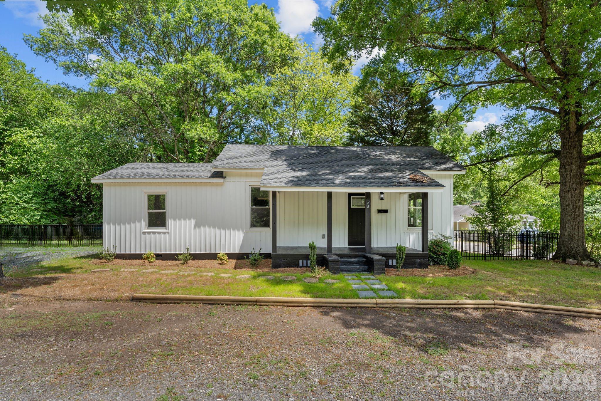 Fully renovated and move-in ready in the heart of Rock Hill! This 3-bedroom, 2-bathroom gem has been meticulously transformed from the inside out. The location offers the best of the city, situated just minutes from Downtown Rock Hill (Old Town) shops and dining, Glencairn Gardens, Winthrop University, Manchester Meadows, and even more! The interior features durable LVP flooring throughout and a stunning kitchen complete with quartz countertops, real tile backsplash, and brand-new stainless appliances. Beyond the cosmetic beauty, this home offers total peace of mind with a brand-new HVAC system, all-new plumbing, new electrical wiring, and a newly added second full bathroom. Step outside to a private, fully fenced yard featuring a brand-new deck perfect for outdoor entertaining. Every detail has been thoughtfully updated with a clean, modern aesthetic. Enjoy the benefits of a fully renovated home in an established, prime location. Truly a must-see!