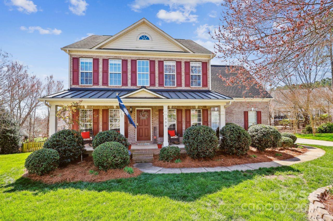 Discover Southern charm in this beautiful, move in ready, cul-de-sac home nestled in Sutton Place.Hardwood floors and crown molding grace the main level of this wonderful home complete with dining room and living room/office.  Large open-concept chef's kitchen with plenty of storage opens to the oversized great room with gas log fireplace. The light filled sunroom rounds out the main floor.Unwind on the screened-in porch overlooking the private backyard with stacked outdoor fireplace and patio.The spacious primary suite boasts dual closets.Three secondary bedrooms (one large enough to be a bonus room) completes the second floor.The 3rd-story flex space is perfect for bonus room, workout room or home office.Updates include new whole-house water filtration system, refrigerator, paint and carpet in 2022 & guest bath flooring, paint,garage door opener and dishwasher in 2024.Desirable HOA amenities.Close to Baxter Village, Kingsley, I-77 and located in the coveted Fort Mill school district.