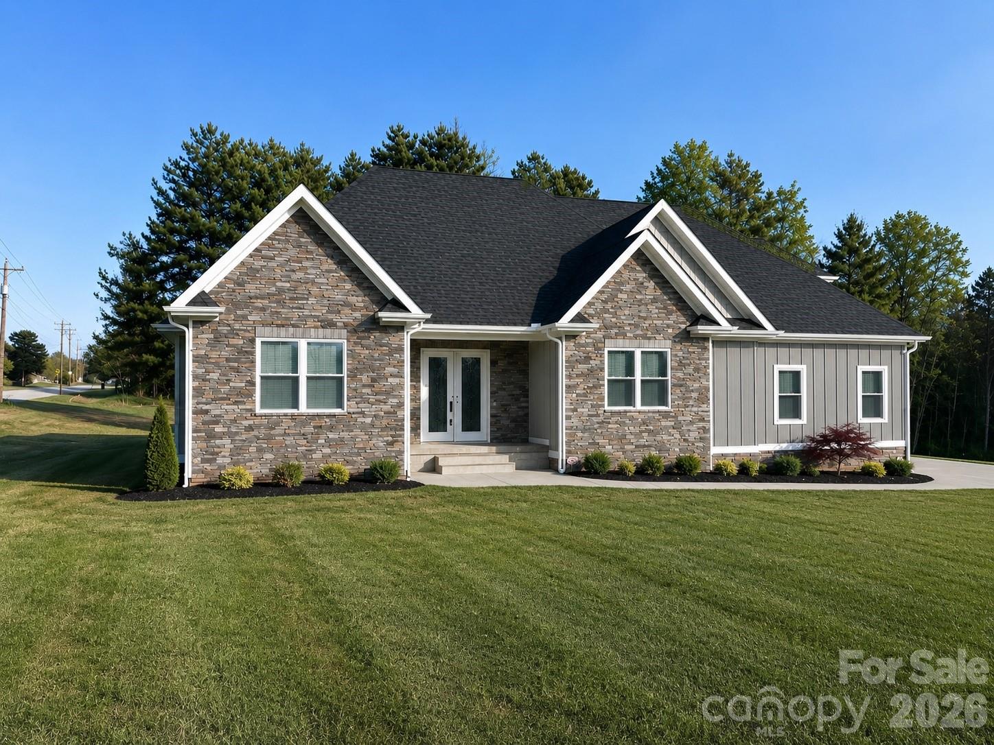 Looking for a custom home with all the bells and whistles, then look no further! Walk through the front doors into your open floor plan that boasts a custom white kitchen with tall cabinetry, granite counter tops, and a huge island. The master bath suite leaves nothing to be desired with a soaking tub, huge custom shower and dual vanities. The rest of the home showcases beautiful crown moldings, 12ft tall ceilings, custom tile work and real hardwood flooring. Upstairs bonus room is great for an extra room, office or play area. The covered back deck is perfect for those relaxing sunset evenings. This home was built with quality and care and it shows! Call today for your showing before it's gone!