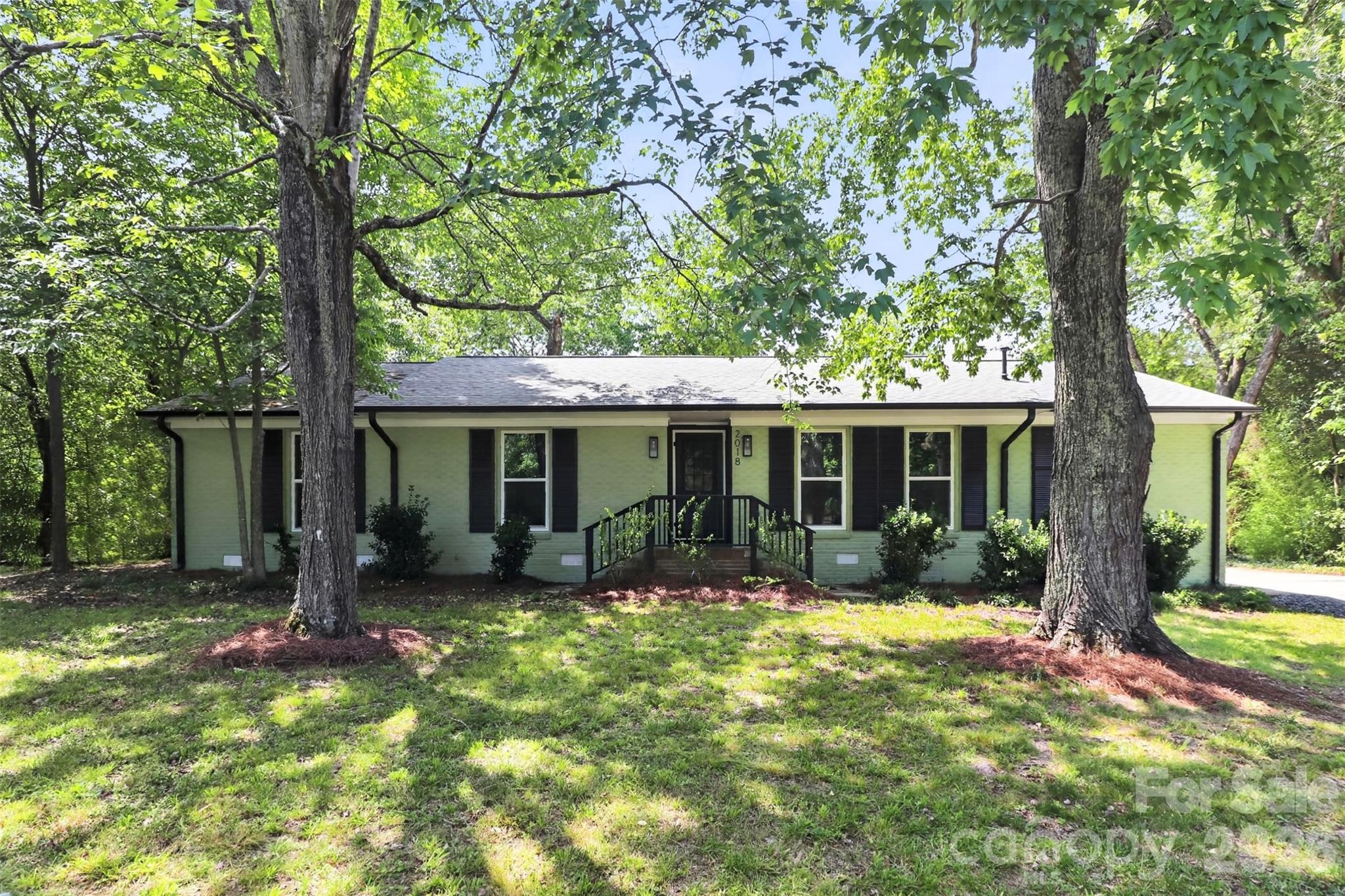 Beautifully updated 3BR/2BA home blending classic charm with modern upgrades! Built in 1965, this inviting home features a spacious living room/dining room combination, cozy den with wood burning fireplace, and an updated kitchen with new cabinets, granite countertops, stainless Samsung appliances including refrigerator, microwave, self-cleaning oven, dishwasher, and a stainless farmhouse sink. Recent improvements include a new roof, new windows, and a new gas HVAC system. New laminate flooring in the kitchen and den, tile flooring in both updated bathrooms, and original hardwood flooring in the living room, dining room, hall, and all 3 bedrooms add warmth and character throughout. The hall bath features an oversized shower and beautiful new vanity and lighting. Home is situated on a private 0.55 acre Cul-De-Sac lot. Move in ready with timeless appeal.