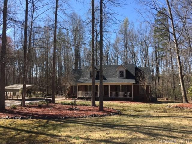 Well maintained home on over an acre-wooded lot.  Full brick with Master Bedroom on the main and an office/4th bedroom on the main.  Two large bedrooms up with shared bath and separate dressing areas.  Remodeled Kitchen with newer Stainless Steel Appliances and tile floors.  Large private backyard.  Backyard features a fenced garden area and a storage building.  Two car carport.