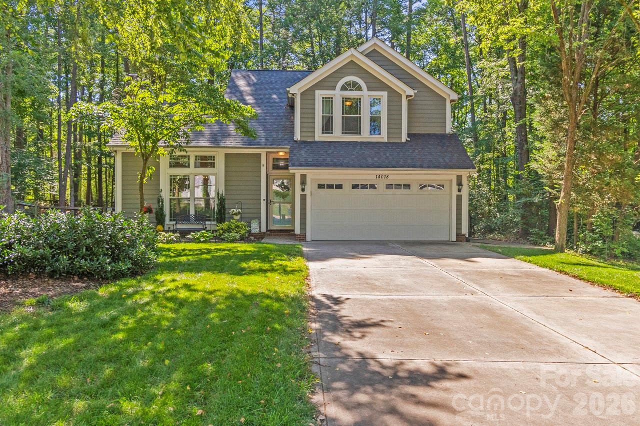 Tucked away at the end of a quiet, tree-lined cul-de-sac, 14018 Naworth Lane offers a peaceful retreat with an unbeatable commuter location. Featuring a newer furnace and beautifully updated kitchen and bathrooms, this move-in-ready home perfectly balances an airy, open feel with cozy, everyday functionality.
Inside, the inviting living room boasts soaring vaulted ceilings, rich hardwood floors, and a cozy wood-burning fireplace. Thoughtfully positioned windows flood the main living areas with beautiful natural light, while the mature canopy of trees outside keeps the home naturally shaded and comfortable all summer long.
The outdoor space is a true highlight of the property. Fully fenced and exceptionally deep, the backyard features an oversized deck made for grilling and outdoor dining, alongside a dedicated fire pit area perfect for starlit evening gatherings.
Enjoy the ultimate combination of privacy and community life. Sidewalks from the neighborhood lead you directly to local favorites like a nearby brewery, ice cream shop, coffee spots, and restaurants. Plus, you are just around the corner from Veterans Park—the town's hub for live music, farmers markets, and festivals—as well as the Huntersville greenway, pickleball courts, and easy access to I-77. Schedule your tour today to experience this perfect balance firsthand!