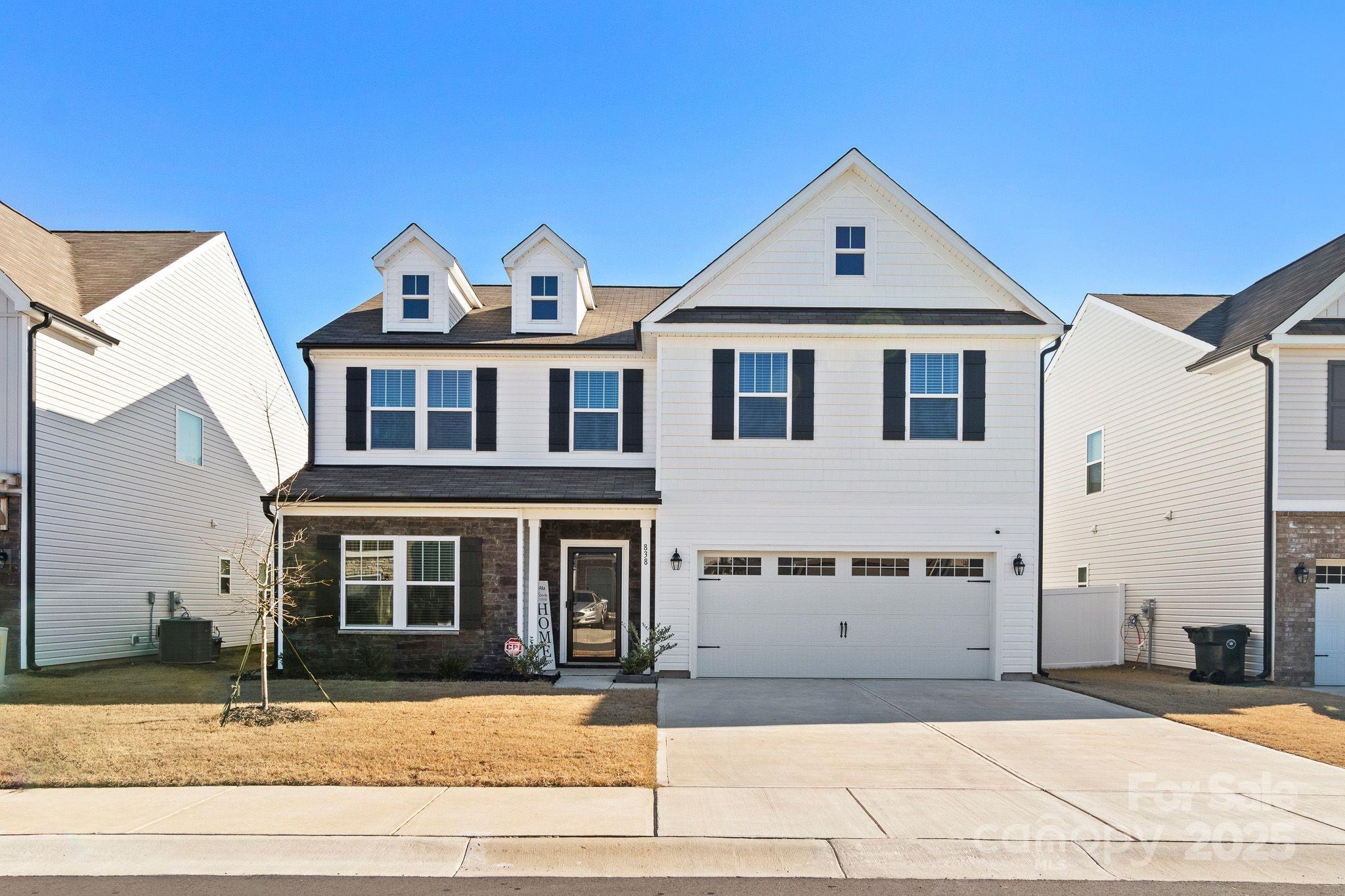 This meticulously maintained beauty is close to new and does not disappoint. There is no need to wait to build, home was built in 2023, so you just move right in. Once inside, the home shows like a model. The formal dining room could be used as an office or flex space and has French doors and another door leading to the breakfast bar area. The kitchen and living areas are open and airy. The island is large and definitely where you can gather at. Quartz countertops and stainless-steel appliances adorn the kitchen. Walk in pantry and a breakfast bar completes this Gourmet Kitchen. A flex space downstairs that could be used as a bedroom. The primary and two additional bedrooms are upstairs. There is a large laundry room upstairs with closet, and a functional bonus also. Fenced in backyard. One of the largest floorplans in this established neighborhood. This one is sure to impress in thriving York! Washer and dryer to convey with the home.