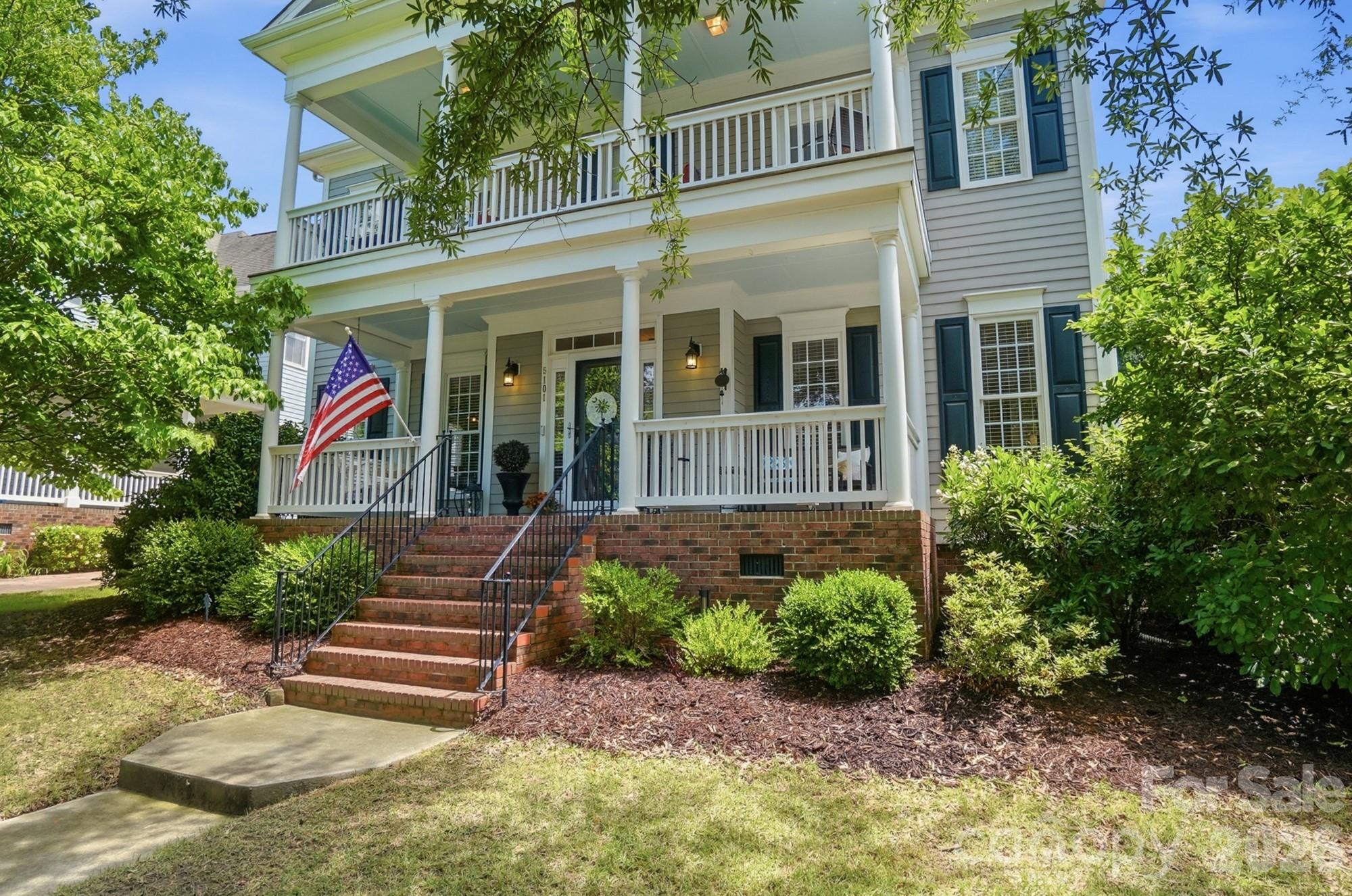 Welcome to Baxter Village living! With 3,447 sf, 4 bedrooms + Bonus, and 3.5 baths, this beautifully maintained home offers privacy, charm, and exceptional functionality, and backs up to a peaceful wooded preserve and a connected trail system. Double front porches create classic Southern curb appeal and inviting outdoor living spaces. Inside, fresh interior paint gives the home a bright, updated feel throughout. The welcoming kitchen opens seamlessly to the spacious great room and features a large center island perfect for gathering and entertaining. A dedicated main-level study provides the ideal work-from-home space or quiet retreat. Upstairs, the spacious primary suite is complemented by a second ensuite bedroom, ideal for guests or multigenerational living. Generous walk-in closets provide abundant storage throughout the home. The huge bonus room with a closet offers endless flexibility as a 5th bedroom, media room, playroom, home gym, or guest suite. Enjoy all that Baxter Village has to offer, including pools, tennis courts, playgrounds, clubhouse, sidewalks, and walking trails, plus the vibrant Baxter Town Center with local shopping, popular eateries, coffee shops, and fitness options just moments away. Conveniently located near charming Downtown Fort Mill and with easy access to Uptown Charlotte, this home offers the perfect blend of community, convenience, and lifestyle within the highly sought-after Fort Mill School District.