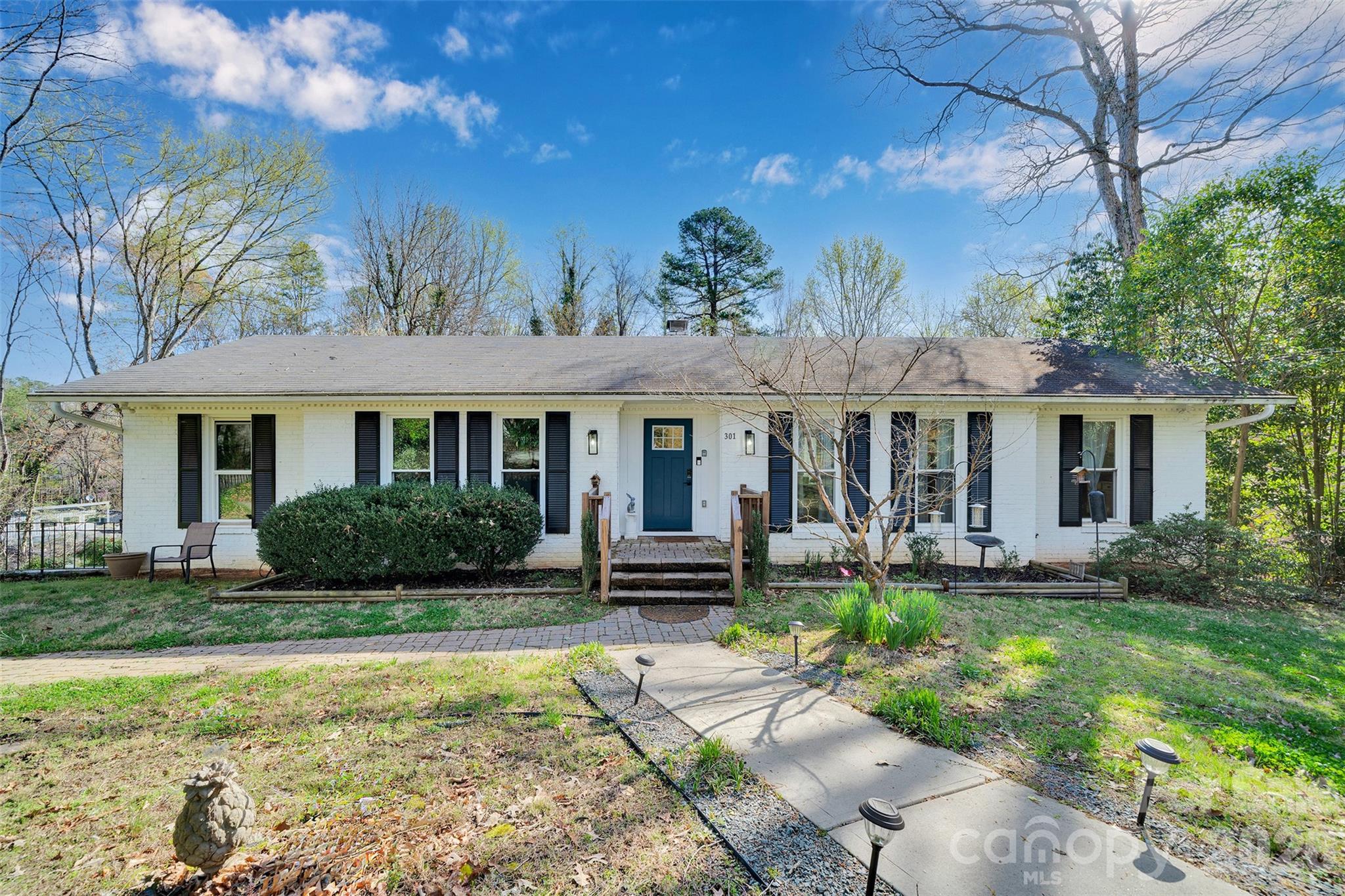 Basement Home!.....Great South Charlotte Location in Providence HS district! Brand New HVAC!! Freshly Painted! Circle Driveway recently added! Nice Open floorplan.....this lovely ranch home had many updates in 2020 and has been well taken care. Kitchen was upfitted with a bar stool island, quartz countertops, stainless appliances, and a whole additional wall of Cabinets. Fridge included! Many of the windows replaced 2 years ago. Beautiful Sunroom/2nd Dining area that allows for lots of natural light. Large walk-out deck with a wooded view. Basement features additional living space, bedroom, full bath, office/play room, and a couple of extra walk-in closets for all your storage needs. Former resident converted laundry area to kitchenette but W/D hookups could easily be flipped back to the interior wall. Outside front retaining wall professionally replaced 2 years ago.....Very Solid! Beautiful surrounding homes in the neighborhood and super convenient to shopping, restaurants, & medical facilities. No HOA! Don't miss this gem!