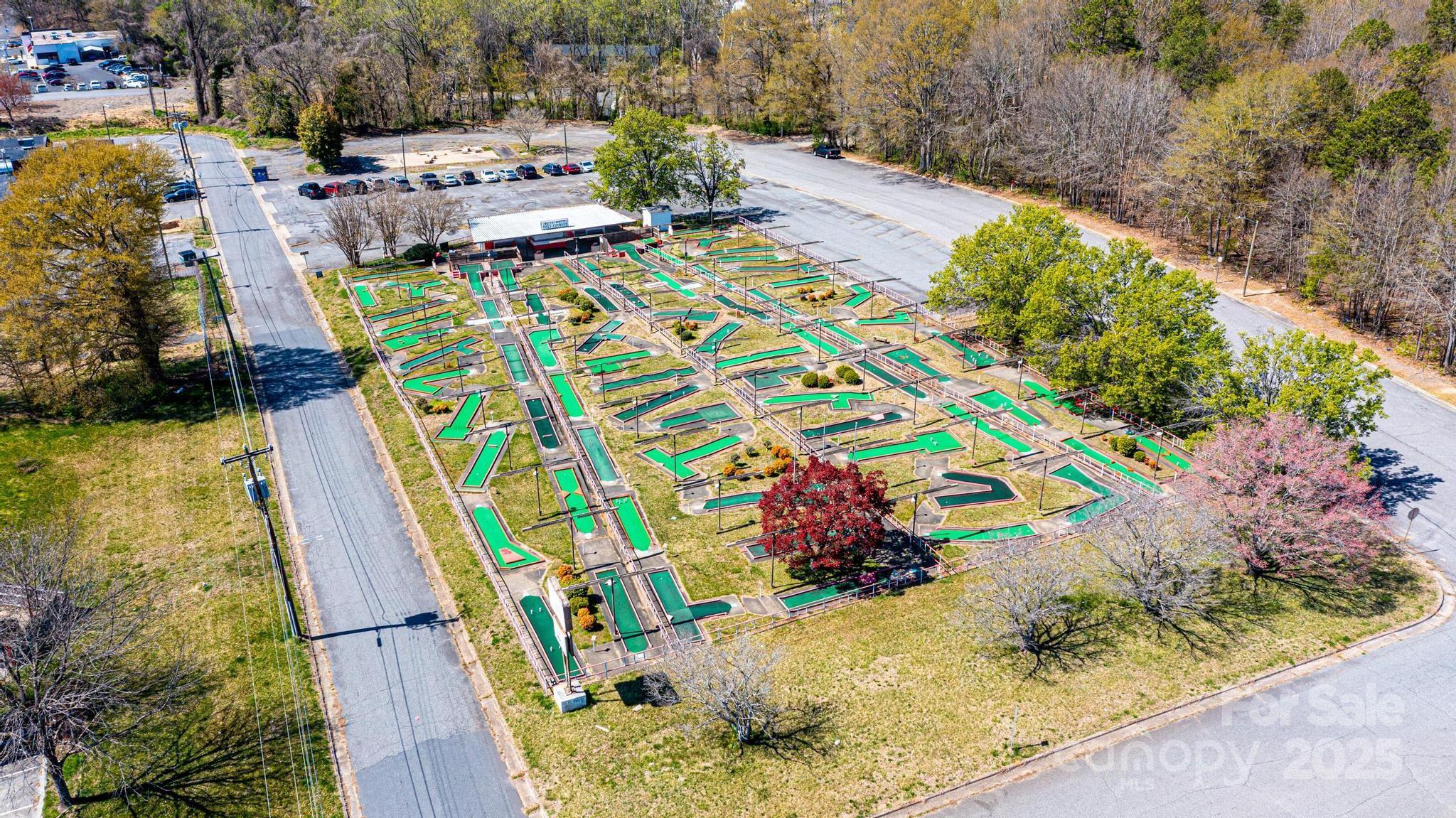 This is a fantastic opportunity to acquire a parcel of prime land in Hickory, located right off Highway 70.  The property features updated putting greens and fresh paint, ensuring the business is ready for operation. A new camera system has been installed for added security, and the large parking area provides ample space for visitors. With its high-traffic location and potential for future growth, this property offers both a solid business venture and a prime piece of real estate. Whether you’re looking to continue the Putt Putt course or explore other development options, this property provides endless possibilities.