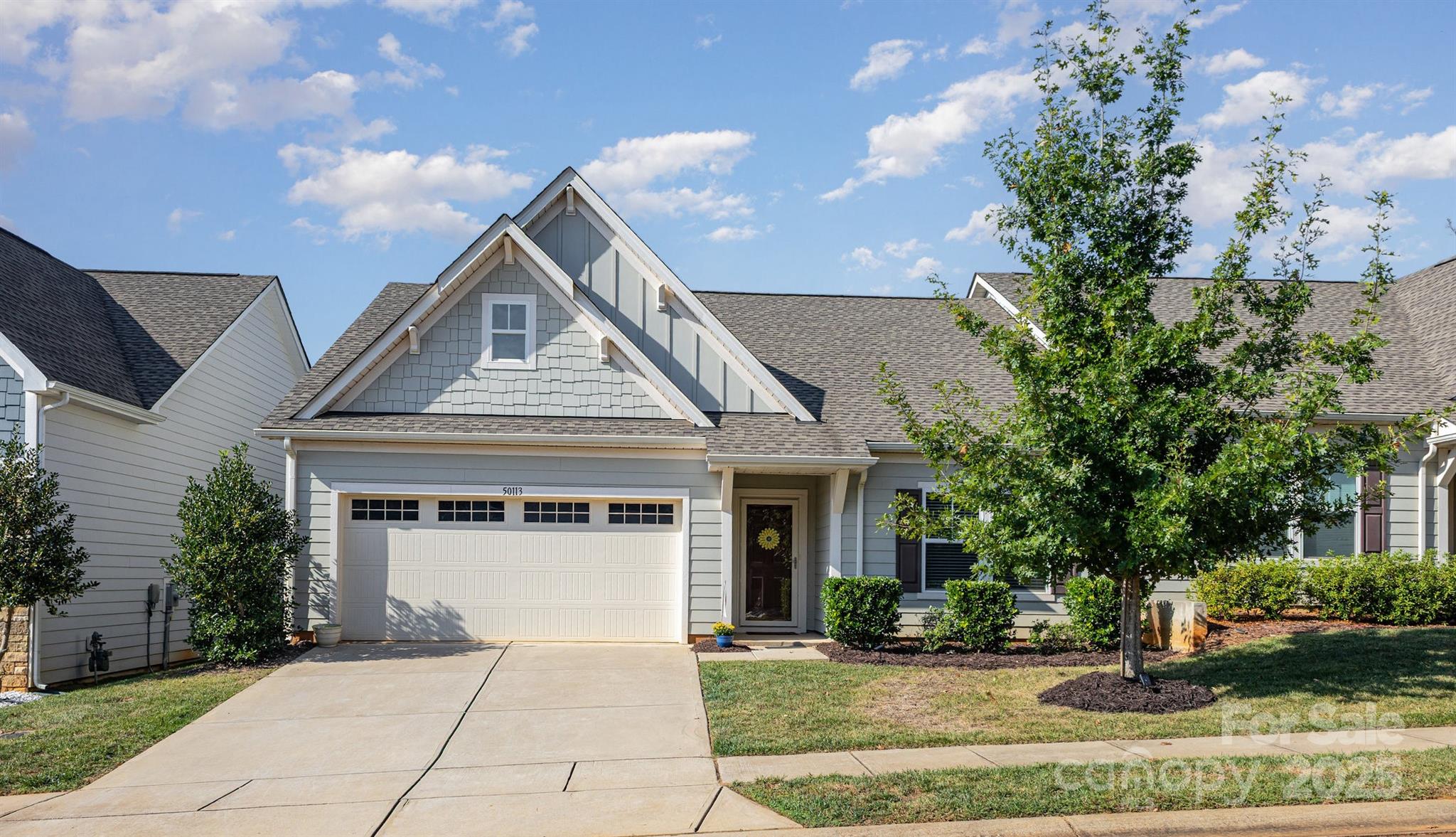 Discover life at The Cottages at Edgewater, where comfort, style, and an inviting lakeside atmosphere come together. This thoughtfully designed single-story 3-bedroom, 2-bath home features beautiful hardwood floors, an open kitchen with a large island and elegant granite countertops, a screened-in back porch, and a two-car garage with generous attic storage. The backyard offers the option to add a black wrought-iron fence, along with the opportunity to plant additional trees for enhanced privacy. Enjoy an exceptional array of community amenities, including the Edgewater Golf Club’s 18-hole championship course, known for its challenging design, and Brickwood Restaurant & Bar, offering an upscale dining experience with Southern inspired cuisine. Additional amenities feature a marina with canoe and kayak rentals, boat slips, and direct water access for residents, as well as a waterfront pavilion, two resort-style swimming pools, lighted tennis courts, over 15 new pickleball courts, and scenic walking and biking trails along Fishing Creek Lake. Lawn care and trash service are included.