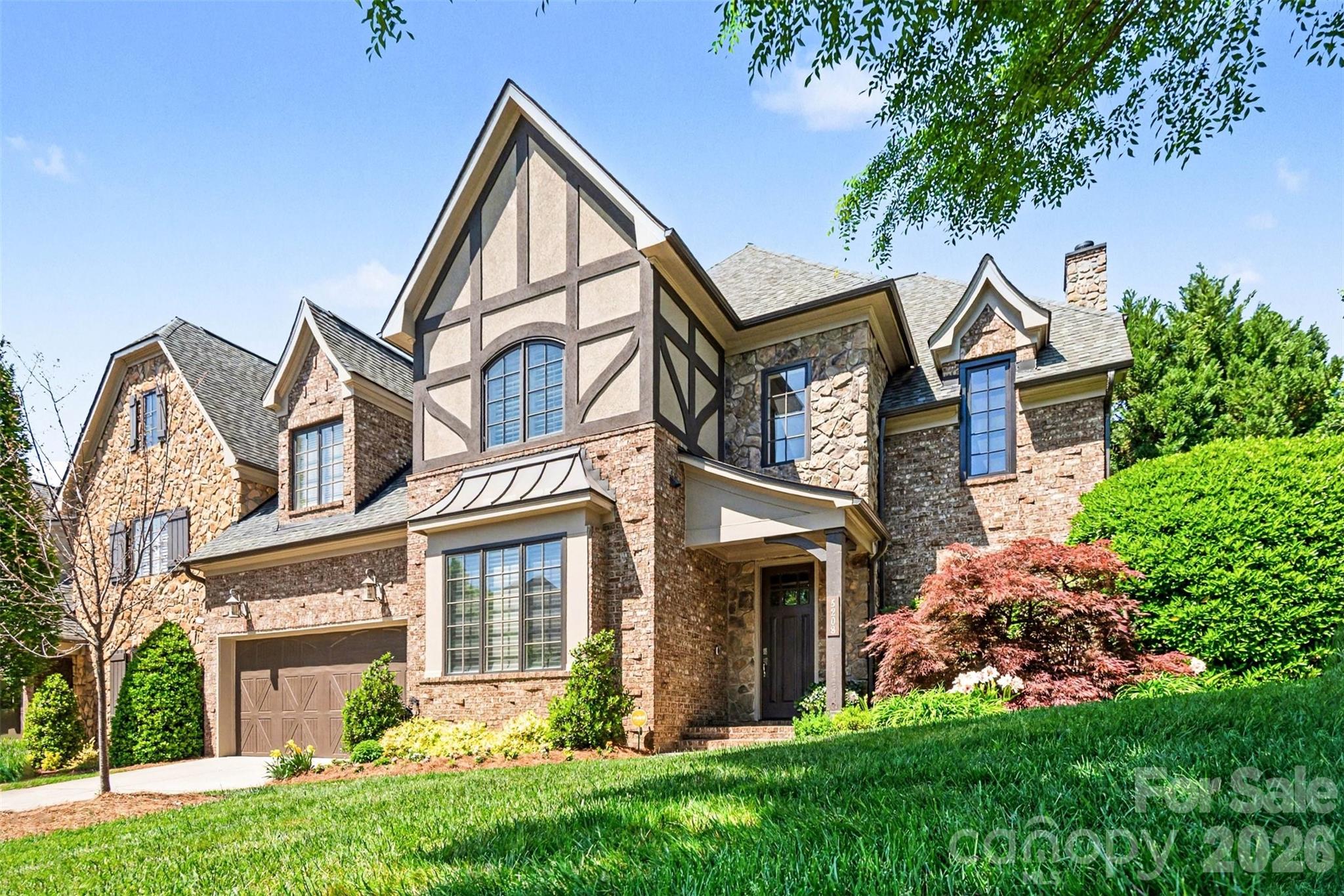 Welcome to this beautifully upgraded END UNIT RESIDENCE in a GATED COMMUNITY where thoughtful design meets elevated, luxury living. Perfectly positioned on an INTERIOR CORNER LOT, this home offers enhanced privacy and an expansive backyard retreat that truly sets it apart.

Step inside to find NATURAL WALNUT HARDWOODS spanning the main level, complemented by fresh paint and new carpet for a crisp, move-in-ready feel. The flexible floor plan offers **4 bedrooms or 3 bedrooms plus a bonus room**, with a PRIMARY SUITE ON MAIN LEVEL designed for both comfort and sophistication.

The kitchen and living spaces seamlessly blend function and style, featuring high-end upgrades like a MOEN TOUCHLESS FAUCET. The home is outfitted with a BUILT IN SPEAKER SYSTEM designed for seamless whole home audio- including professional wiring and infrastructure by Audio Advice. Easily compatible with systems like Sonos (components not included)

The primary suite is a standout, complete with a CUSTOM CLOSETS BY DESIGN SYSTEM and a spa-inspired bath featuring a CUSTOM STAINED GLASS WINDOW and a premium TOTO Washlet Japanese commode—bringing a true sense of luxury to daily routines.

Step outside and discover your own private BACKYARD OASIS professionally designed by Benton Outdoor Living and Ponders, Inc.. Enjoy evenings under the PERGOLA WITH RANIER MOTORIZED SHADE SCREEN, the soothing sounds of a custom WATER FEATURE, and the convenience of drip irrigation and landscape lighting. A hot tub connection is already in place, making it easy to further enhance the space.

Additional upgrades and features include:

* RINNAI TANKLESS GAS WATER HEATER with programmable thermostat
* CSI WHOLE HOUSE WATER FILTRATION AND SOFTENER SYSTEM with app control
* NEW ENERGY EFFECIENT HEAT RESISTANT WINDOWS in the staircase
* HVAC REPLACED IN 2023
* CLOSETS BY DESIGN GARAGE STORAGE SYSTEM
* EXTENSIVE WALK IN ATTIC STORAGE
* LARGE LAUNDRY WITH ADDED CABINETS FOR ADDITIONAL STORAGE
* VIVANT SECURITY SYSTEM

This home offers a rare combination of high-end finishes, smart home features, and exceptional outdoor living, all in a desirable end-unit setting. Ideal for those who appreciate both luxury details and everyday functionality.