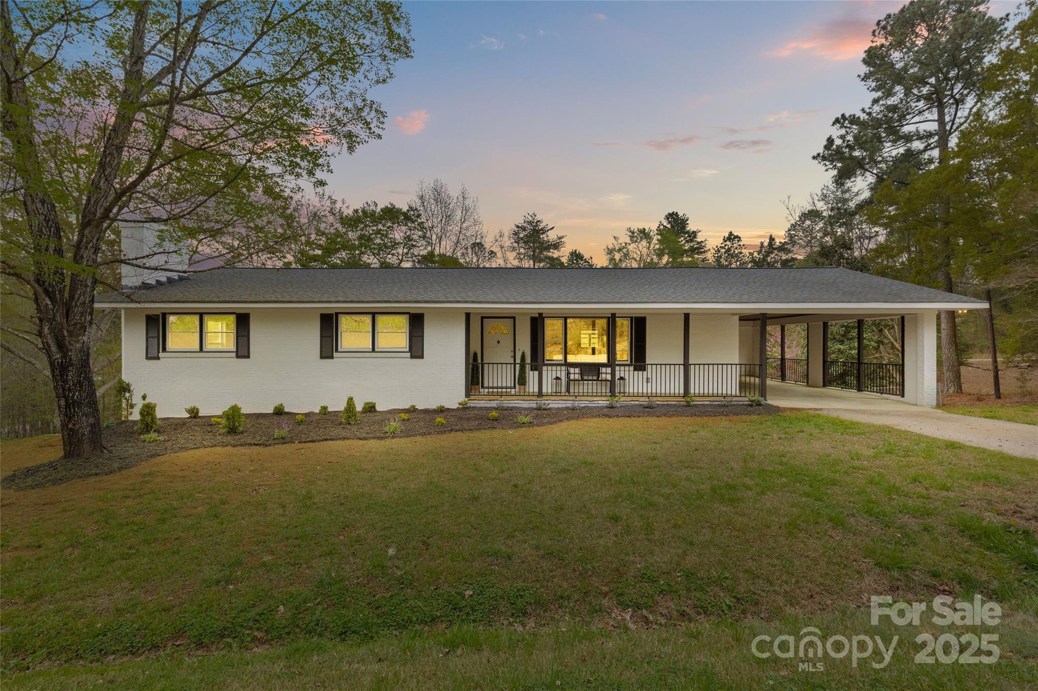 Welcome to your dream retreat on Lake Wylie! 

This completely renovated ranch offers luxurious living with water views and an open floor plan. Chef's kitchen, features new appliances and a large island seamlessly flowing into the living area. 

Main floor hosts a primary bedroom with lake views and a stunning bathroom with walk-in shower. An additional bedroom with a full bathroom on main provides comfort and convenience for guests. 

Extend your living space outdoors with the incredible covered back porch, running the length of the house, ideal for relaxing or entertaining. 

Fully finished basement offers gracious living areas with French doors leading out to a sprawling 1.5-acre lot.  Two additional bedrooms and full bathroom down. 

Please note that while the dock provides access to the lake, it is in need of repair, and we kindly ask that no one walk on it. Seller is an investor and has never visited the property.

This move-in ready gem is a rare find.