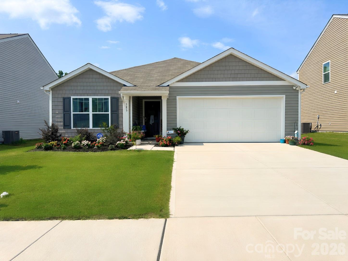Why wait months for new construction when you can move right into a nearly new home today? Built in 2025, this beautifully maintained 3-bedroom, 2-bath ranch offers 1,618 square feet of thoughtfully designed living space in Chester's popular Woodhaven community.

Unlike many builder inventory homes, this one already includes the extras buyers often end up purchasing after closing. All kitchen appliances, washer, dryer, window blinds, curtains, drapes, and curtain rods convey, making your move simple and stress-free. The current owner has also enhanced the property with established landscaping, flower beds, and fresh mulch, giving the home curb appeal that's already a step ahead.

Inside, you'll find an open-concept floor plan featuring durable and low-maintenance luxury vinyl plank flooring, a spacious kitchen with island and pantry, a welcoming foyer, and a private primary suite with a walk-in closet. The attached two-car garage and single-level layout add everyday convenience.

Residents of Woodhaven enjoy community amenities including a pool, cabana, playground, sidewalks, and streetlights. Plus, the transferable builder warranty provides added peace of mind.

This home offers the opportunity to enjoy the benefits of new construction without the wait, uncertainty, or additional out-of-pocket expenses for upgrades and finishing touches.

Seller is offering up to $5,000 in buyer concessions, plus preferred lender is offering an additional $2,500 lender credit. Move-in ready, beautifully maintained, and available now—this is the opportunity you've been waiting for.