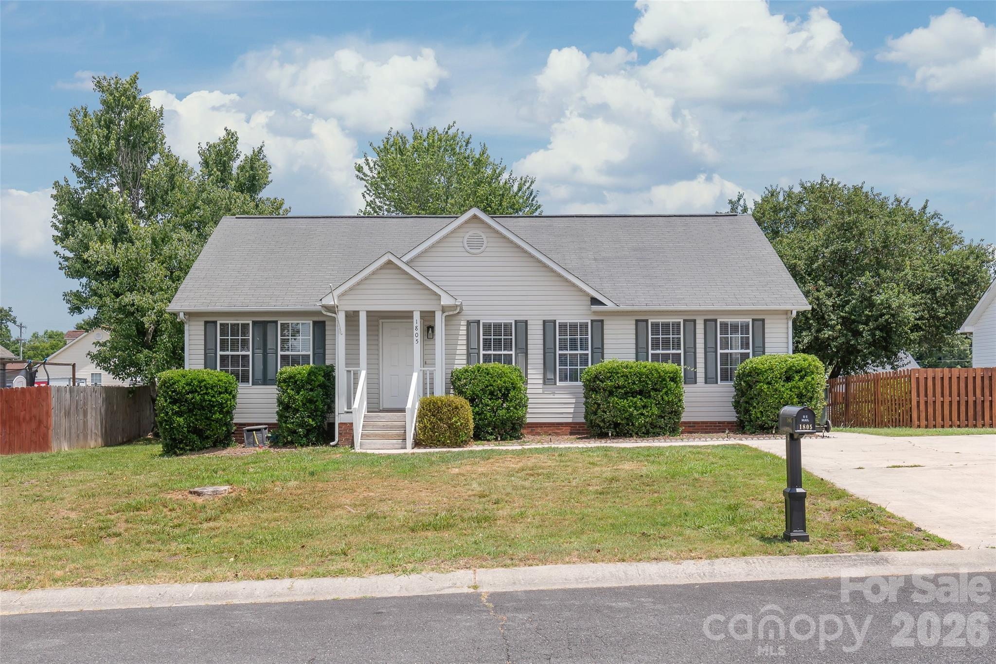 Enjoy NO HOA, low SC taxes, and quiet living but still close to lots of great things Rock Hill offers.  The home features high vaulted ceilings, an oversized deck on a large flat lot. Buy with no worries the home features a new crawlspace vapor barrier, recently treated and bonded against termites, new lifeproof luxury vinyl plank flooring added ($4500 of value) and fresh paint throughout.