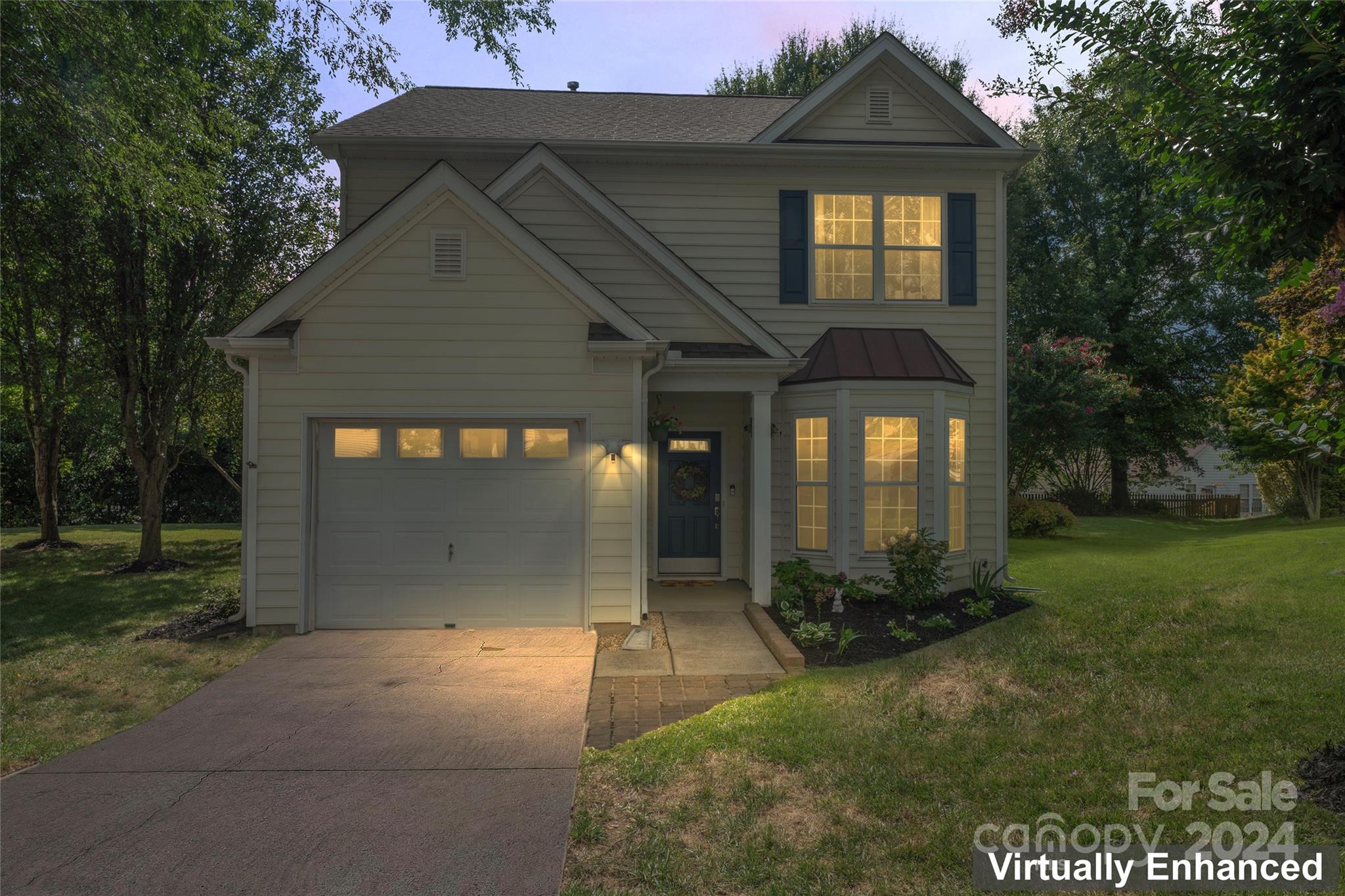 You will absolutely fall in love with this meticulously maintained 3 bedroom, 2.5 bathroom home in the desirable subdivision of Waterstone in Fort Mill. This home is in a prime location and is on a quiet cul-de-sac! Gorgeous laminate hardwoods throughout the entire home (1st and 2nd floors). Enjoy your spacious kitchen with ample cabinetry and breakfast bar which opens to the beautiful living room, perfect for entertaining your guests! Walk right out to your patio and private yard. Upstairs you'll find an oversized primary suite with large walk-in closet, bathroom with a garden tub and dual vanity sinks overlooks a private backyard oasis. Enjoy all that Waterstone subdivision has to offer including a recreation area, outdoor pool, playground, sidewalks,  award-winning Fort Mill schools, easy access to I-77, and conveniently located near grocery stores, restaurants, parks, etc.

Dining room light fixture in pictures does not convey with the home.