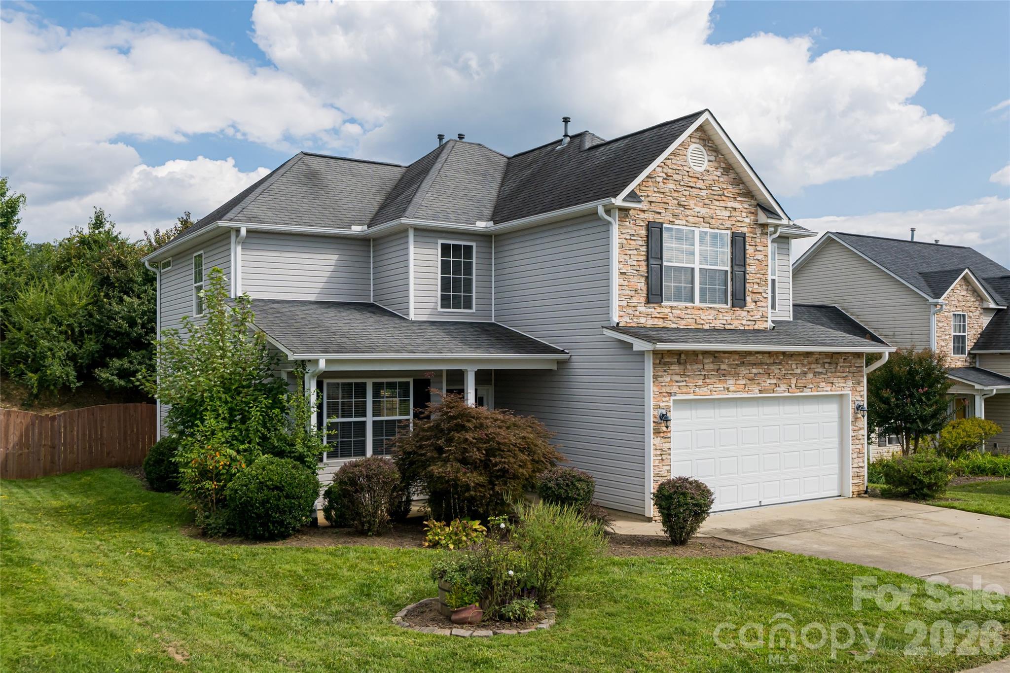 Welcome to this spacious 4-bedroom home located in the well established River Stone community! Designed for modern living, the main level features an open floor plan that seamlessly connects the kitchen and living area, perfect for entertaining or everyday family life. The kitchen boasts state-of-the-art appliances, and there's also a  dining room plus a flexible space ideal for a home office or playroom. Step outside to a private, fenced backyard with a screened-in porch, great for relaxing or hosting friends. Enjoy all that River Stone has to offer, including a community pool and playground. Conveniently located between Asheville and Hendersonville with easy access to I-26 for commuting, shopping, and dining. Don’t miss your chance to make this wonderful home yours! ***Photos with furniture have been virtually staged***