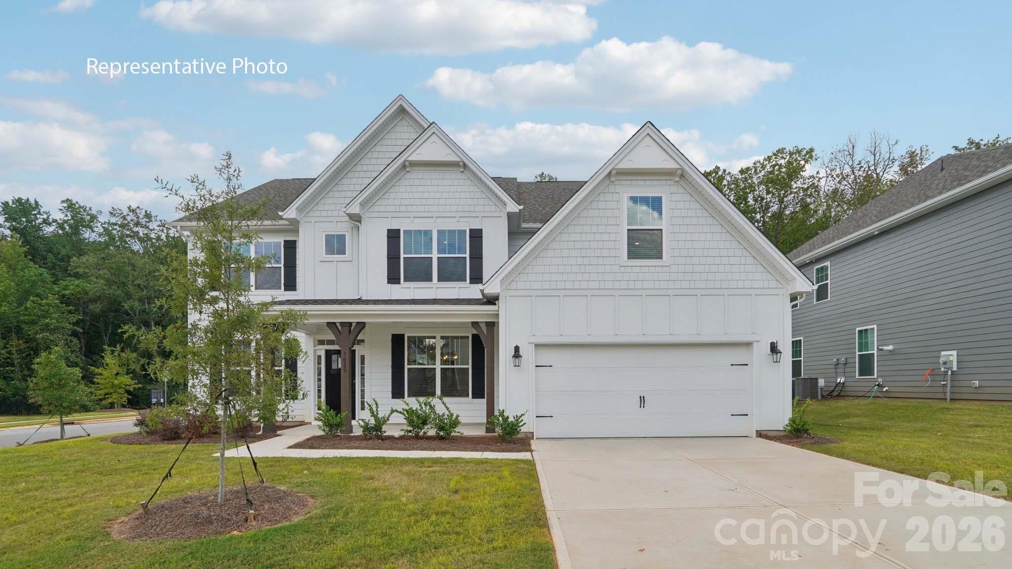 Welcome to Brantley, America's #1 Builder's new exclusive community in Mooresville! Enjoy a unique boutique community with only 57 homes surrounded by trees and walking trails, located directly across the street from Mooresville Graded Schools! NEW CONSTRUCTION home with tons of upgrades! Formal dining room connects to a gorgeous Butler's pantry and breakfast bar opening to a kitchen-family room concept with a gas fireplace. Spacious eating area opens to a rear covered patio awaiting future outdoor memories! 1st floor guest suite with full bathroom and convenient mud room with a built-in drop zone! Hardwood staircase lined with wrought iron spindles opens to a generous sized loft. Primary suite is the epidemy of luxury adorned with a trey ceiling, a sitting room and an oversized closet! Gorgeous primary bath tile shower and soaking garden tub. This home also features a covered patio to enjoy! Tankless water heater, double ovens, smart home technology package, modern crown molding and cased windows all come with your brand new home!  Ask about our amazing finance incentives!