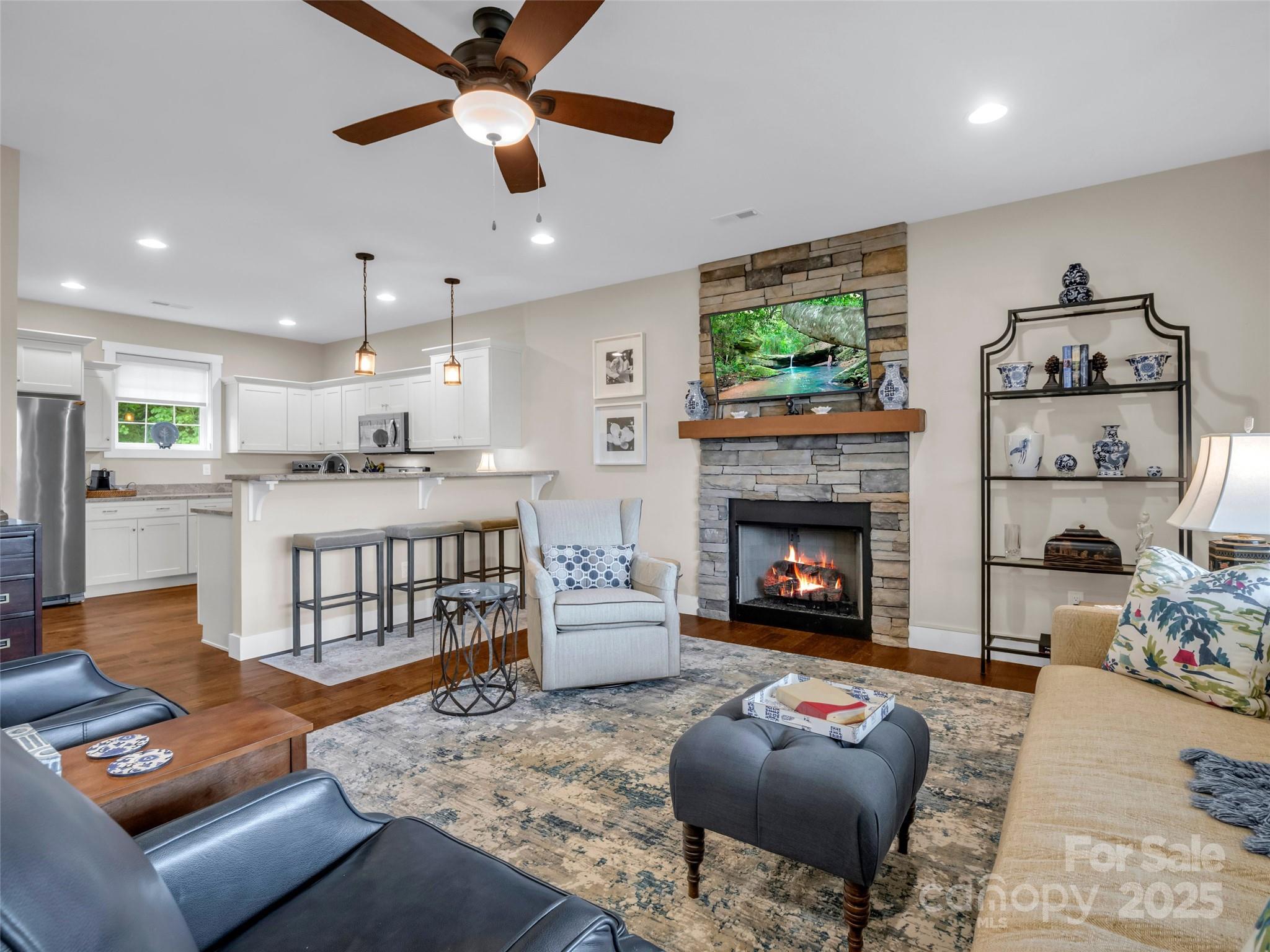 Here's an opportunity to purchase a beautiful one story condo in the gated community of The Vista at Bills Mountain. Enjoy the gorgeous sunsets toward the Hickory Nut Gorge along with the mountain views from the Primary bedroom, Living room and rear porch. Many upgrades to this unit including a back porch that has been covered and screened in for your comfort. Great clubhouse, gym and pool. Pictures do not do this unit justice. A must see for anyone looking for a great Condo. Furniture available with acceptable offer.