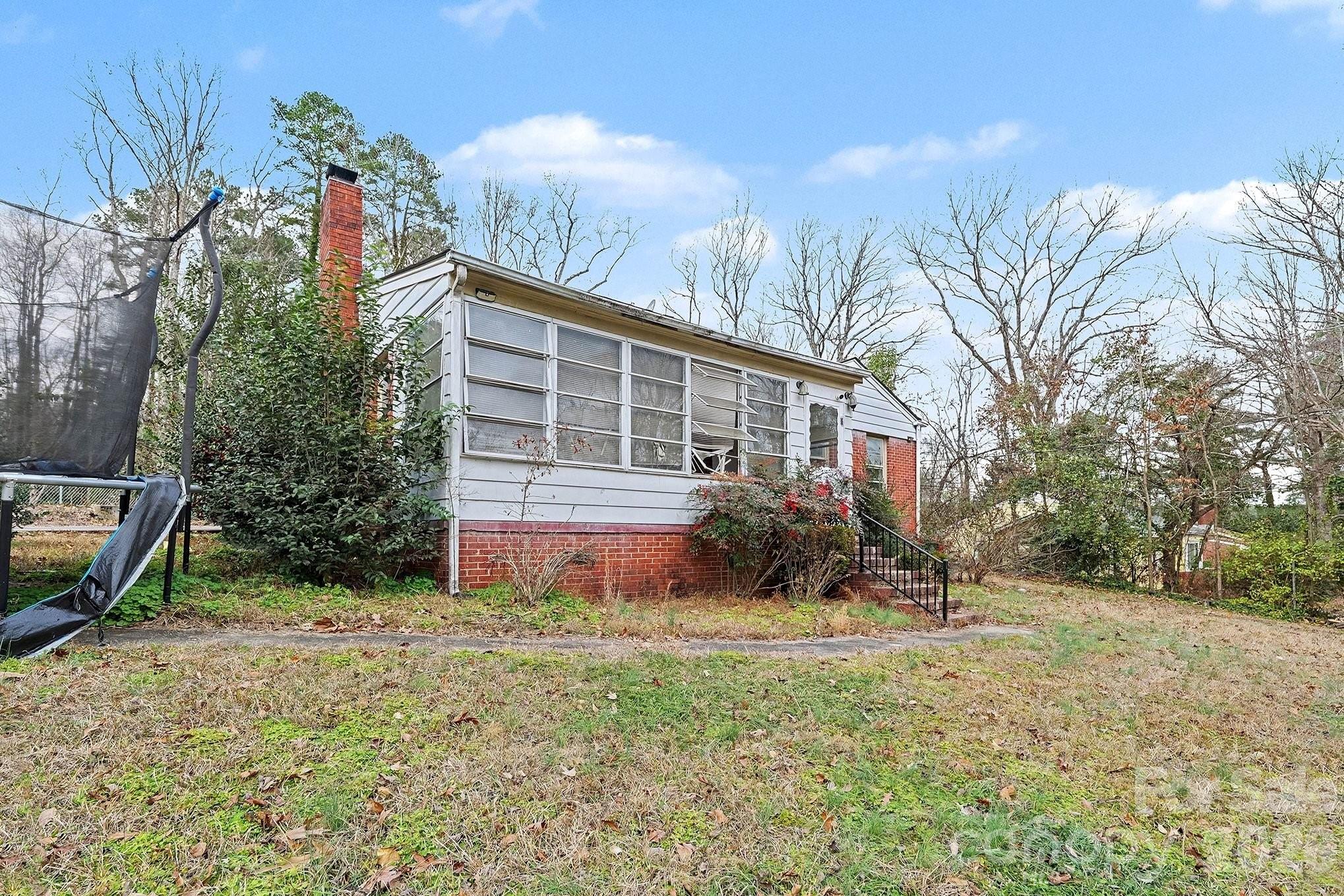 Move-In Ready Brick Home in a Fantastic Location. This charming 3-bedroom, 2-bath brick home is now vacant and ready for its next owner! Featuring a spacious and flexible layout, the home offers a comfortable family room, an additional bonus living room, and a bright sunroom—perfect for relaxing, entertaining, or creating a home office or hobby space. Ideally located just minutes from Uptown with convenient access to shopping, dining, and major roadways, this property combines comfort with convenience. Solid brick construction adds timeless appeal and durability. Recent improvements include a new water heater installed last year and a recently serviced HVAC system, providing added peace of mind. Previously used as a rental property, this home presents an excellent opportunity for both homeowners and investors seeking a move-in ready property in a desirable area.
Don’t miss your chance to own a versatile home in a prime location!