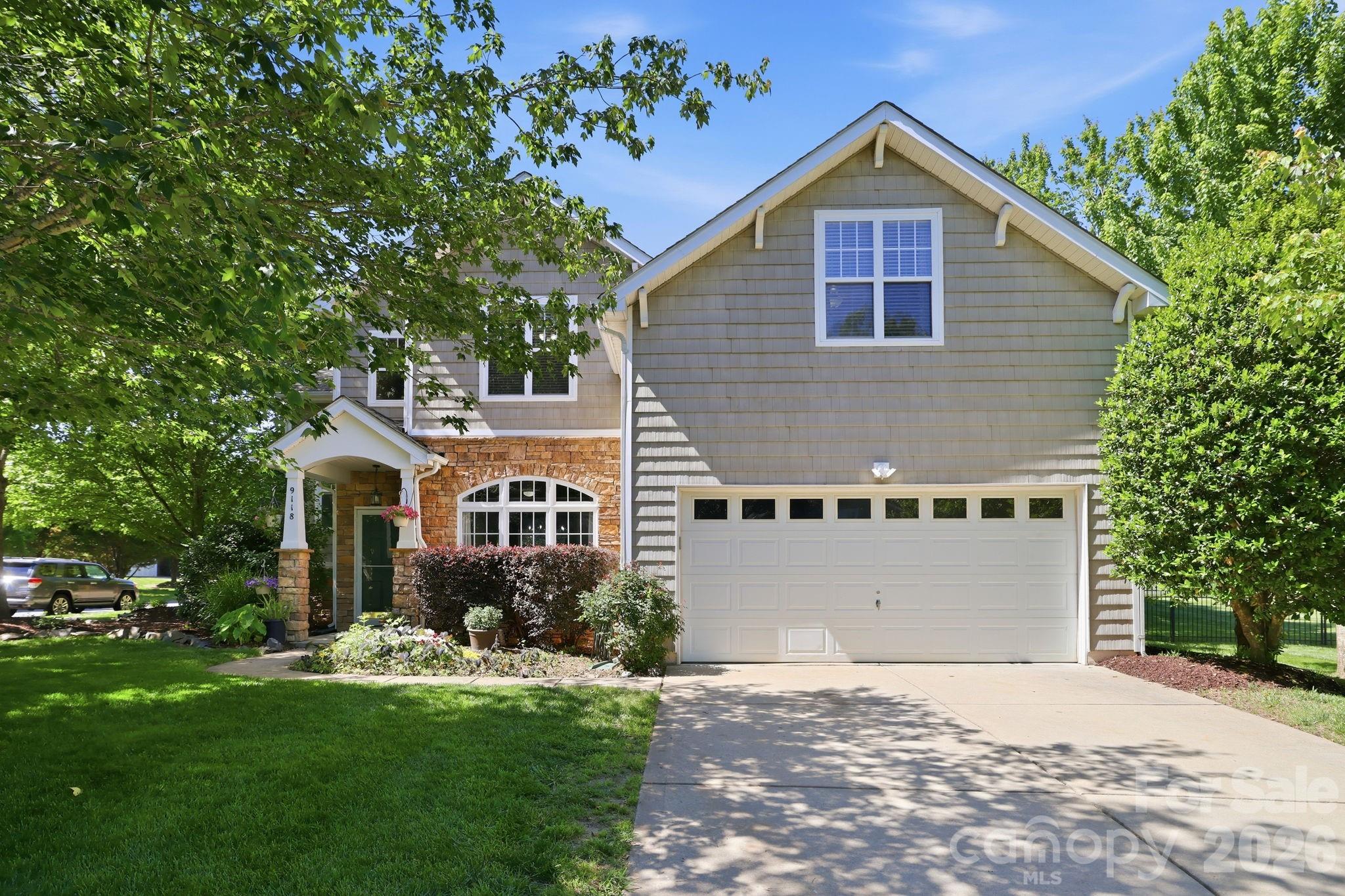 Beautiful home for sale in The Reserve on a lush corner lot in the highly sought after Marvin Ridge school district. This spacious 5 bedroom home also features a dedicated office/sunroom and is loaded with custom details throughout. The main level showcases wide plank hickory hardwood floors, a stunning custom stone fireplace with reclaimed 200+ year old mantel and accent lighting.  The kitchen and bathrooms feature tile flooring and granite countertops, while the primary suite offers a luxurious custom shower and soaking tub. Stainless steel appliances complete the well appointed kitchen.  Enjoy outdoor living in the fenced backyard featuring a12X12 workshop with electricity, an extended flagstone patio with fire pit and a custom covered seating area perfect for entertaining. Community amenities include a pool, new playground and clubhouse.  Major updates include roof, water heater, A/C and furnace all replaced in 2019.  County taxes only.  This home combines comfort, craftsmanship and location.  A must see! Preferred Lender offering a Lender Funded 1-0 Buy down for loans $300k plus , locked by 6/15 and close by July 31st.