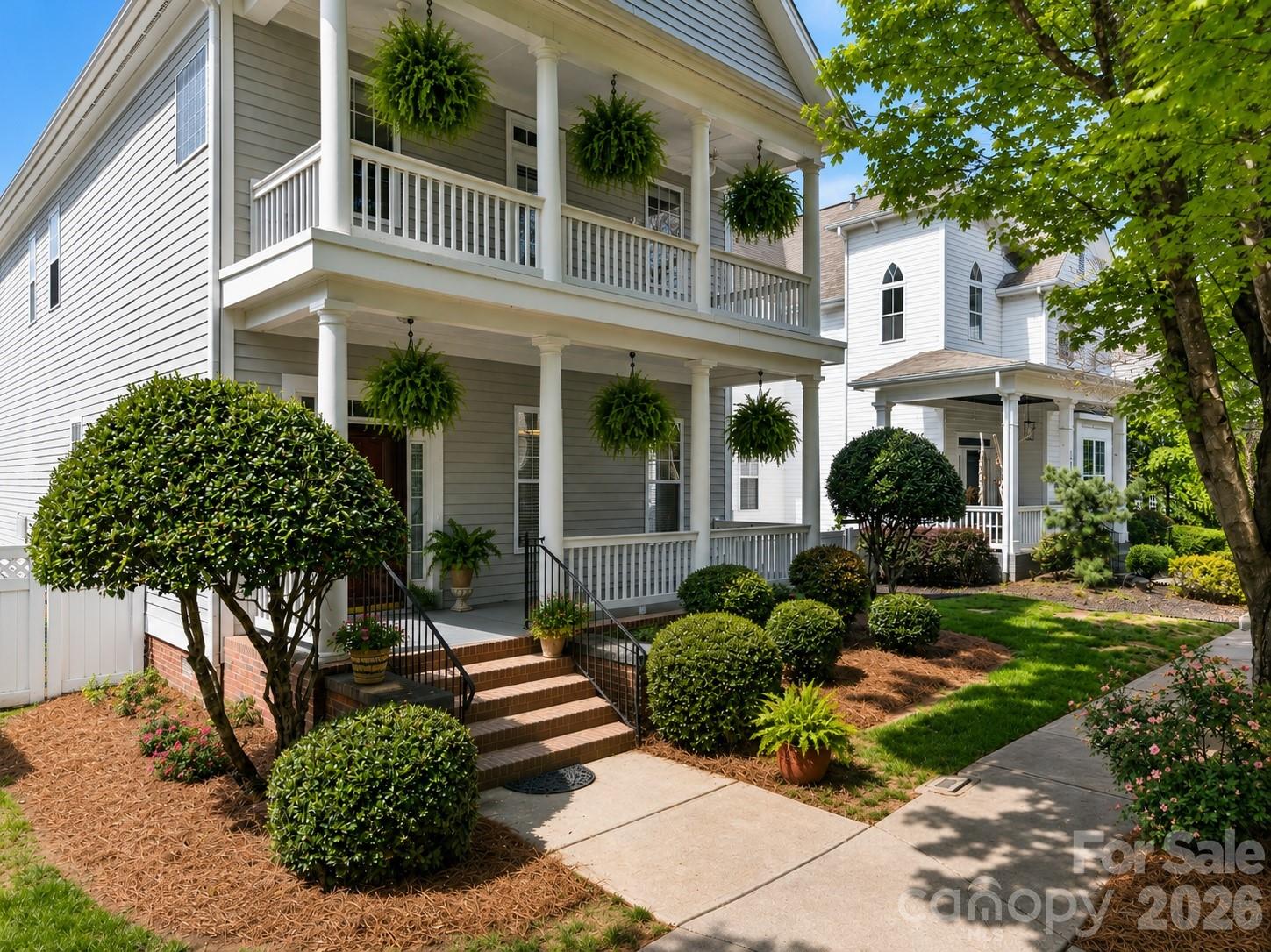 This one owner home in Birkdale Village reminds most of often of Charleston homes with its open floor plan, historic style and quality finishes.  This home offers more than its private garden oasis, open living area with wonderful natural light. It offers the nearby marinas with the best of Lake Norman living.   New carpet and painted neutral throughout. This community also offers tree lined sidewalks that lead you to an active lifestyle with access to  miles of trails throughout Cornelius, wonderful dining, first class shopping, Birkdale Golf and community amenities that include pickleball, pool & tennis. Robinson Park  is just around the corner as well.  The giant front first floor porch  is perfect for morning cups of coffee or evening drinks.  Just off the foyer with its high ceilings and gleaming hardwood, the dining room awaits your special occasions w your favorite guests.The kitchen with its expansive counter space is open to the breakfast and family room.  Step out of the primary on to your second floor balcony or  cozy back porch for the perfect place to read that thriller you've been waiting on or afternoon tea. 
  
Entertain in the fenced in backyard. Private patio surrounded by lush mature landscaping.This spring and every season will be a delight to see what blooms. The family that lived here loved gardening, they even have room for a vegetable garden. 
Enjoy all that Lake Norman has to offer or pop out to I-77 to only minutes to Charlotte for world class  ARTS, Theatre, NFL,  and NBA.