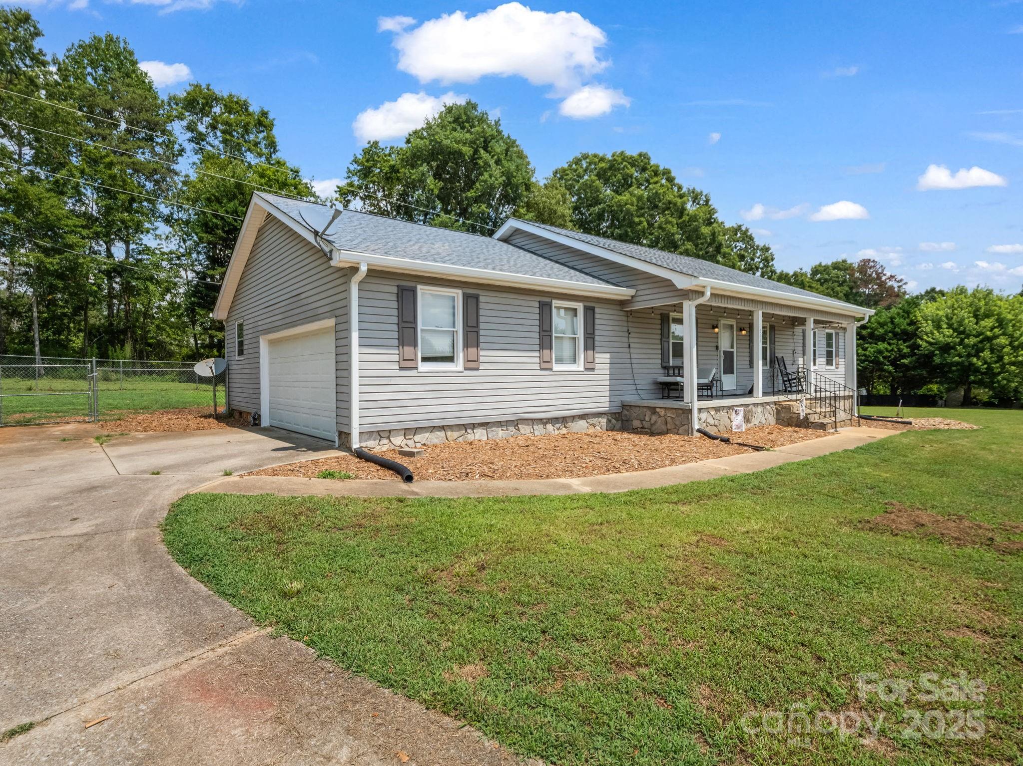 MOTIVATED SELLER!  This spacious home will offer you comfort and style with 1,671 square feet of living space.  Featuring over 1.00 acre along with a fenced in backyard for outdoor entertaining.  Step inside to find an inviting floor plan, spacious areas and great natural light.  Also featuring an Amish built large work shed and concrete drive.  Plenty of room in your attached garage for additional storage.  New 2 1/2 ton HVAC system 2025, New Roof 2025, deck redone in 2023, and encapsulated crawl space and dehumidifier.  Located outside of the city limits but close to schools and stores.  Will not disappoint!  Seller's jobs have required them to move away.