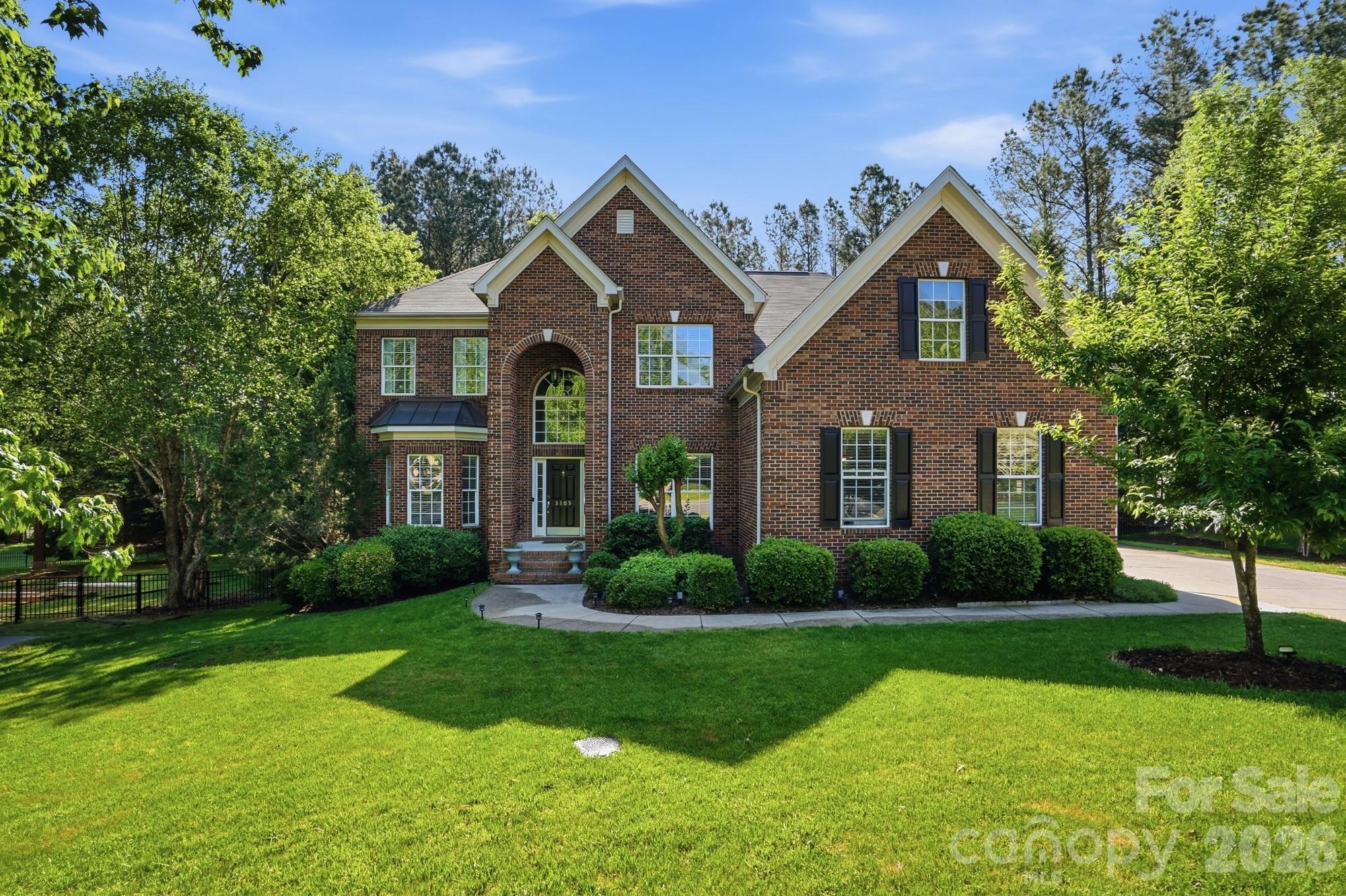 Move in ready home in sought-after Quellin!! Perfectly positioned on a quiet cul-de-sac in the heart of Waxhaw, this spacious 5-bedroom, 3.5-bath transitional home offers 3,742 sq ft of thoughtfully designed living space with a highly functional, open layout ideal for both everyday living and entertaining.

Step inside to find a welcoming two-story living area, formal dining room, and flexible living space perfect for a home office. The great room features a cozy gas fireplace and flows seamlessly into the kitchen, complete with white cabinetry, stainless steel appliances, double ovens, gas cooktop, and breakfast area.

Main floor expansive primary suite offers a relaxing retreat with a garden tub, separate shower, and dual vanities and walk-in closet. Additional bedrooms are generously sized, and a large bonus room provides endless possibilities for a media room, playroom, or guest space.

Enjoy outdoor living on the deck and patio overlooking a private, fenced backyard. Additional highlights include a 3-car side-load garage, insulated windows, and mature landscaping.
Located in a highly desirable community with amenities including a clubhouse, pool, playground, pond, and walking trails, pickleball and basketball courts.—plus top-rated Cuthbertson schools.

Classic curb appeal, generous space, and a prime location—this is Waxhaw living at its finest.