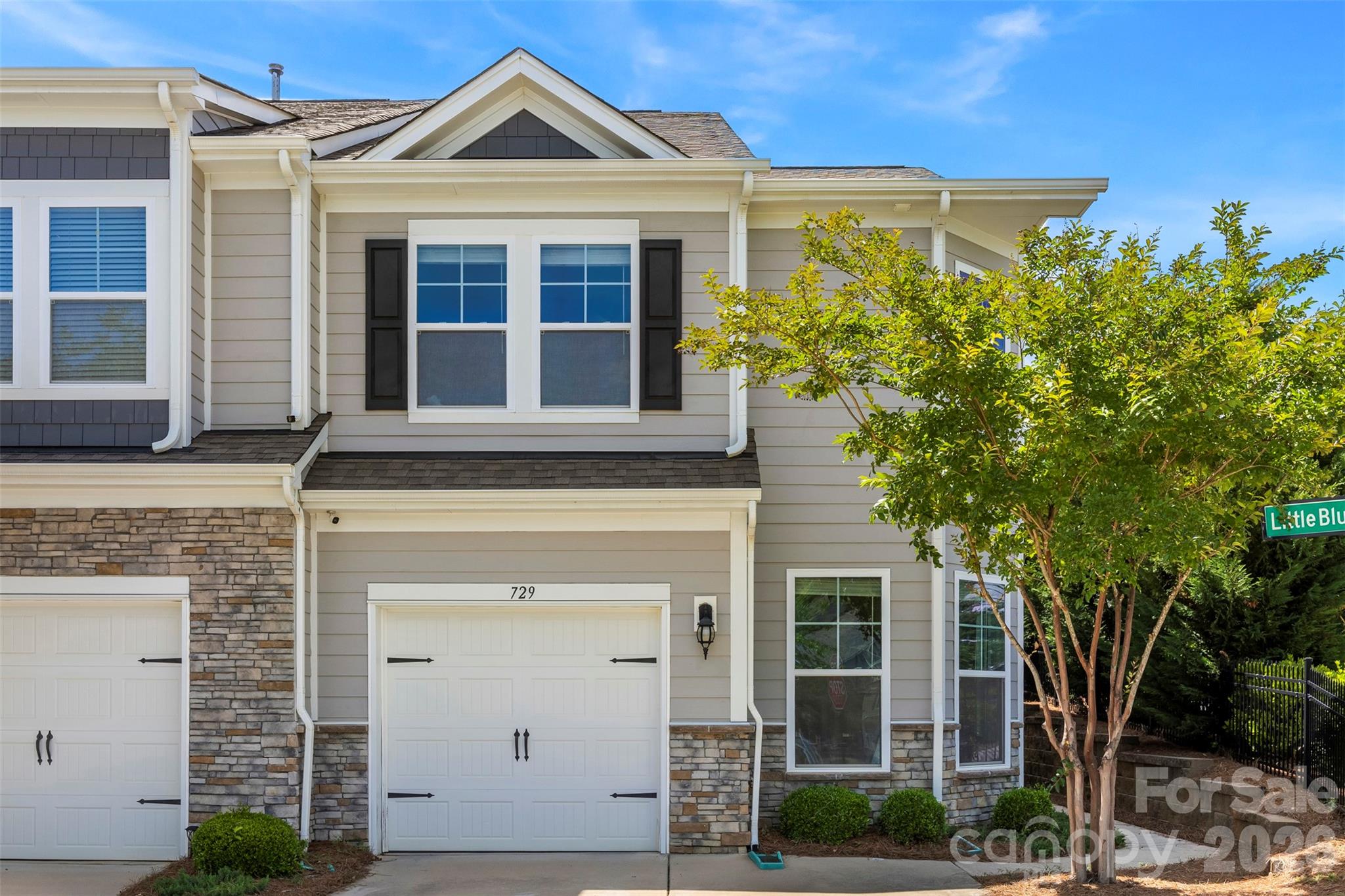 SELLER IS OFFERING A $5,000 SELLER CONCESSION WITH AN ACCEPTABLE OFFER! Welcome to 729 Little Blue Stem, a beautifully maintained end-unit townhome in the heart of Lake Wylie, SC, offering 3 bedrooms, 2.5 bathrooms, 1,807 square feet, and thoughtful design throughout. The open-concept main level creates an inviting flow, featuring a spacious living area along with a dedicated office/flex space ideal for working from home or additional functionality. Upstairs, you’ll find all three bedrooms along with a versatile loft space that can be used as a second living area, playroom, or reading nook. The primary suite features a walk-in closet and a beautiful glass walk-in shower. A spacious walk-in laundry room is also conveniently located upstairs, adding ease to daily living. As an end unit, the home enjoys added privacy and abundant natural light, enhancing its bright and airy atmosphere. Residents also benefit from community amenities including a clubhouse, pool, playground, and pickleball court, all while being just minutes from shopping, dining, and everything Lake Wylie has to offer.