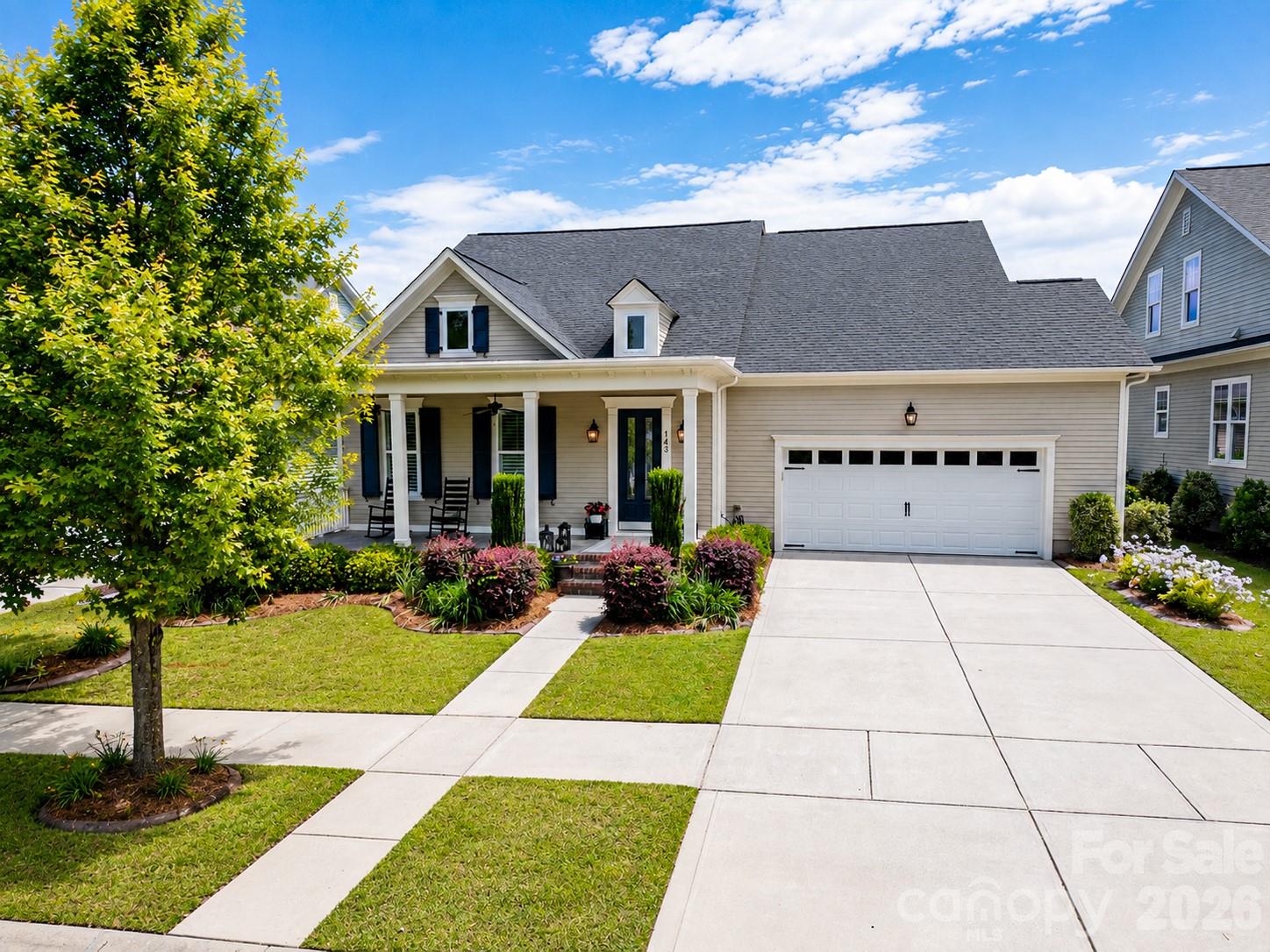 The prestigious home builder, The Cunnane Group Inc, has created this two story, 4 bedroom, 3 bath home with 3,000 sq ft for you to consider today. The craftsmanship and attention to detail immediately create an amazing first impression as you enter the home. Hardwood floors are throughout the main living area. Large windows enhance the access to natural light. The open floor plan accentuates the kitchen with it's large 4ft X 8ft island and upgraded additional kitchen cabinetry. Now to the family room featuring a gas fireplace. Plantation shutters are throughout! Primary and secondary bedrooms are both on the main floor. Step out and onto the tiled, screened-in back porch to enjoy your professionally landscaped yard and yes a natural gas line is set up for your outdoor grilling needs! You will also have a home that is one of the closest to Kings Town Elementary School. It's just a few doors down the road and the Fort Mill Schools are some of the top in the state!