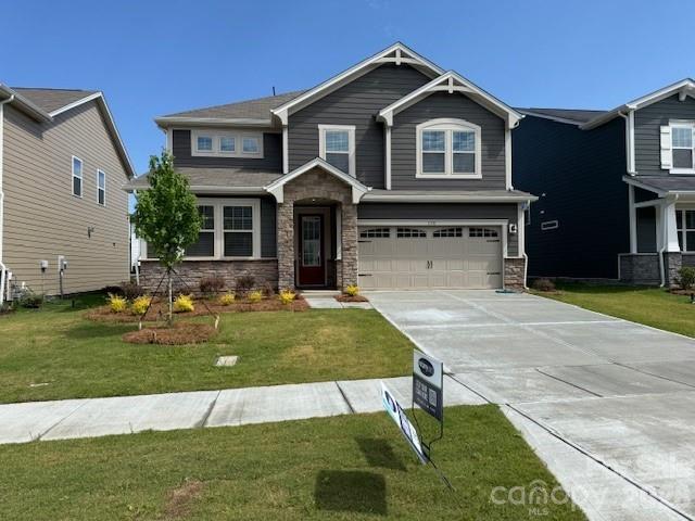 Charming Sequoia, a 5 bedroom 4 bath home with welcoming front porch, open-concept kitchen flowing into the great room with upgraded cabinets, stainless steel appliances, and luxury enhanced flooring and with a study and guest suite down. Enjoy 8ft sliders leading to a patio with views off back.  The second-floor primary suite boast walk in closet and a luxurious bathroom with soaking tub and separate shower.  Additional highlight include a loft for entertaining, 3 spacious bedrooms, one with its own bath, plus second full bath, and a convenient laundry room.  Community  amenities include an outdoor pool, cabana, picnic pavilion, sidewalks, and streetlights.  Close to downtown Historic Waxhaw and downtown Monroe.  Short distance to Wesley Chapel and Sun Valley. Photos are for MLS purposes only.