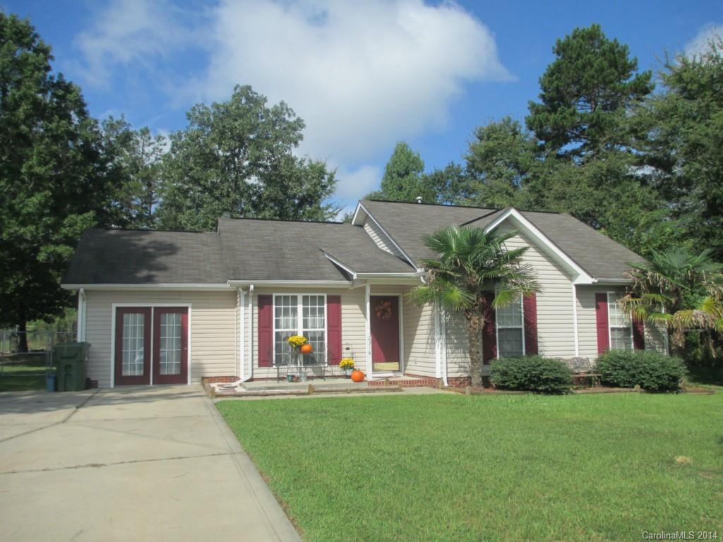 Beautiful starter home in established neighborhood. Well maintained and ready to move in. Home features cathedral ceilings in living room and master bedroom, updated laminate flooring in living and hallway, laminate flooring in large cozy den/office off kitchen. Sliding glass doors lead from dining area to patio with arbor and deck. Storage building and fenced backyard.