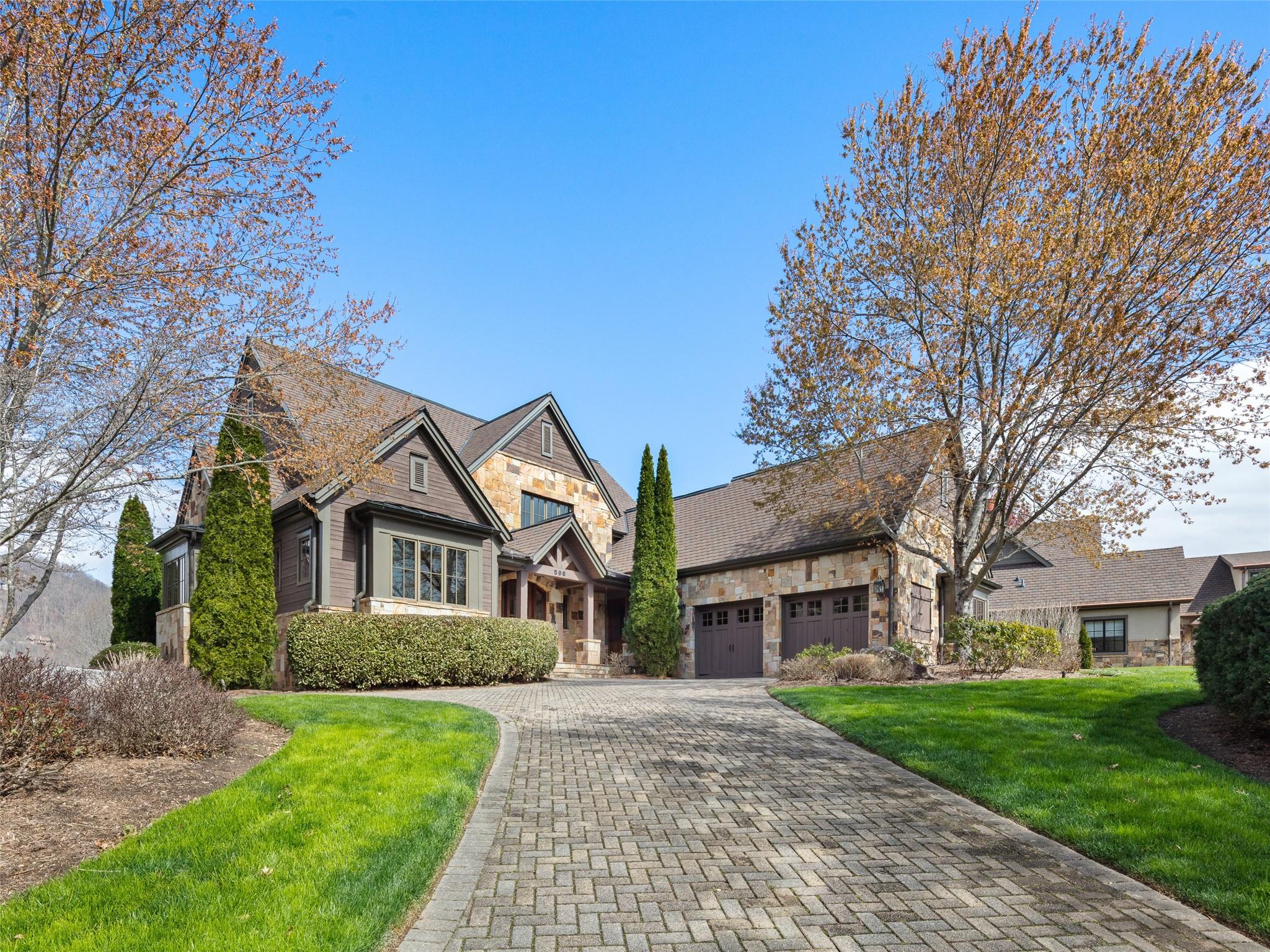 Located just off the first green of the Jack Nicklaus Signature Golf Course in The Meadow enclave, this warm and elegant European style mountain retreat is one of the few remaining hidden gems in The Cliffs at Walnut Cove. This home provides a gracious lifestyle with an open floor plan, main level living, ample entertaining spaces along with commanding long-range views of the magnificent Blue Ridge Mountains! Open a bottle of your favorite vintage and invite your guests to enjoy pleasant evening breezes on your screen porch with phantom screens; or cozy up in front of the fireplace on a cool evening. The heart of the home shines as your gourmet kitchen opens directly to an inviting keeping room and dining area. Just minutes from the club, golf course, and wellness center, the ease of living is further enhanced with The Meadows POA managing all the landscaping; whether for lock-and-leave living or full-time residency. Full golf membership available!